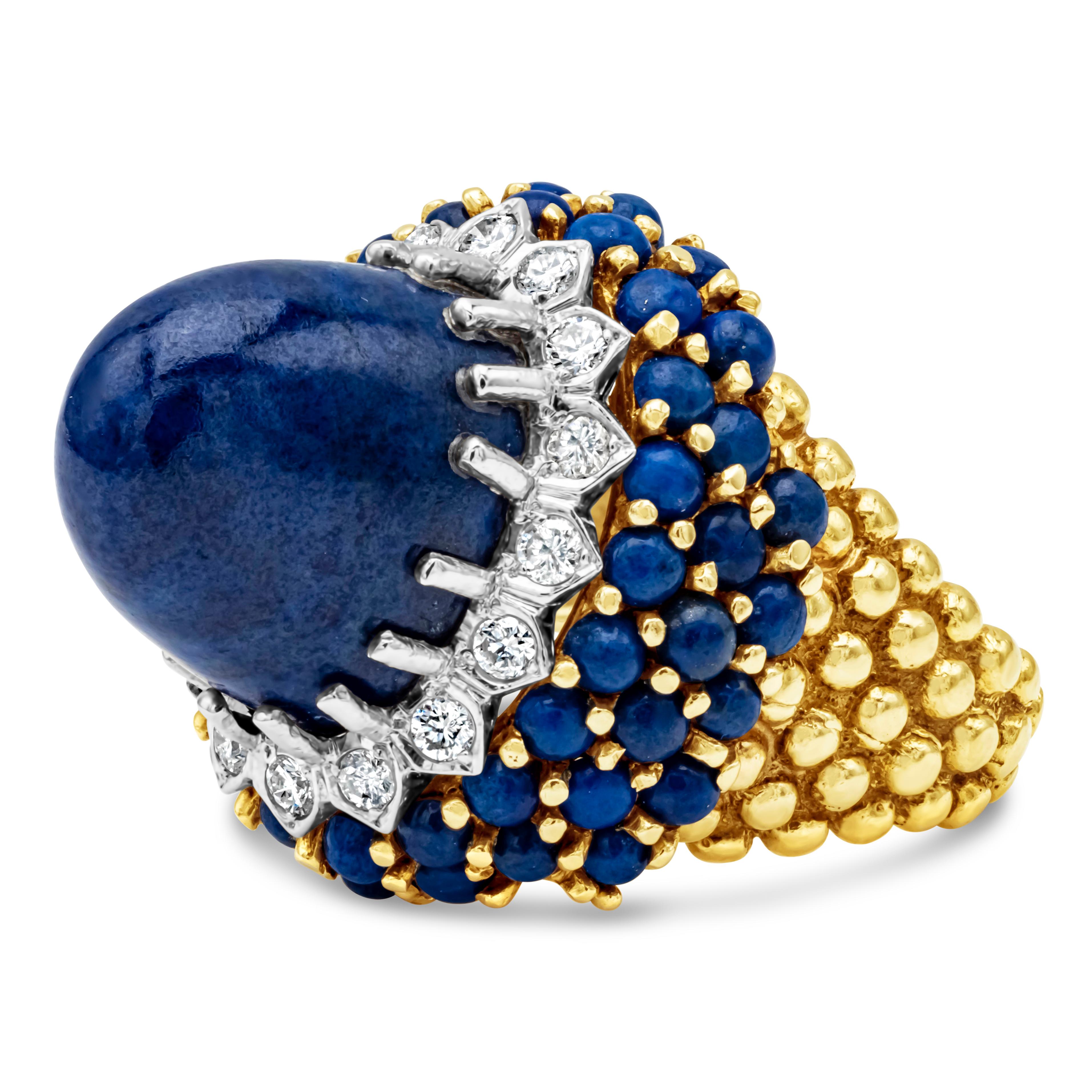  This vintage high dome cocktail ring showcasing a lapis lazuli blue cabochon the center stone, encrusted with 16 brilliant round shape diamonds weighing 0.50 carats total. Set in a beautiful dome with blue cabochon in 18k yellow gold. Size 7.5 US.