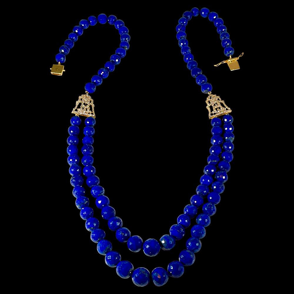 Vintage Lapis Lazuli Double Strand Diamond Necklace 14 Kt Yellow Gold Clasp
This marvelous vintage Lapis Lazuli  necklace features two row of luscious  Beads .
Both side has a beautiful diamond clasp which is holding the two strands
(measuring