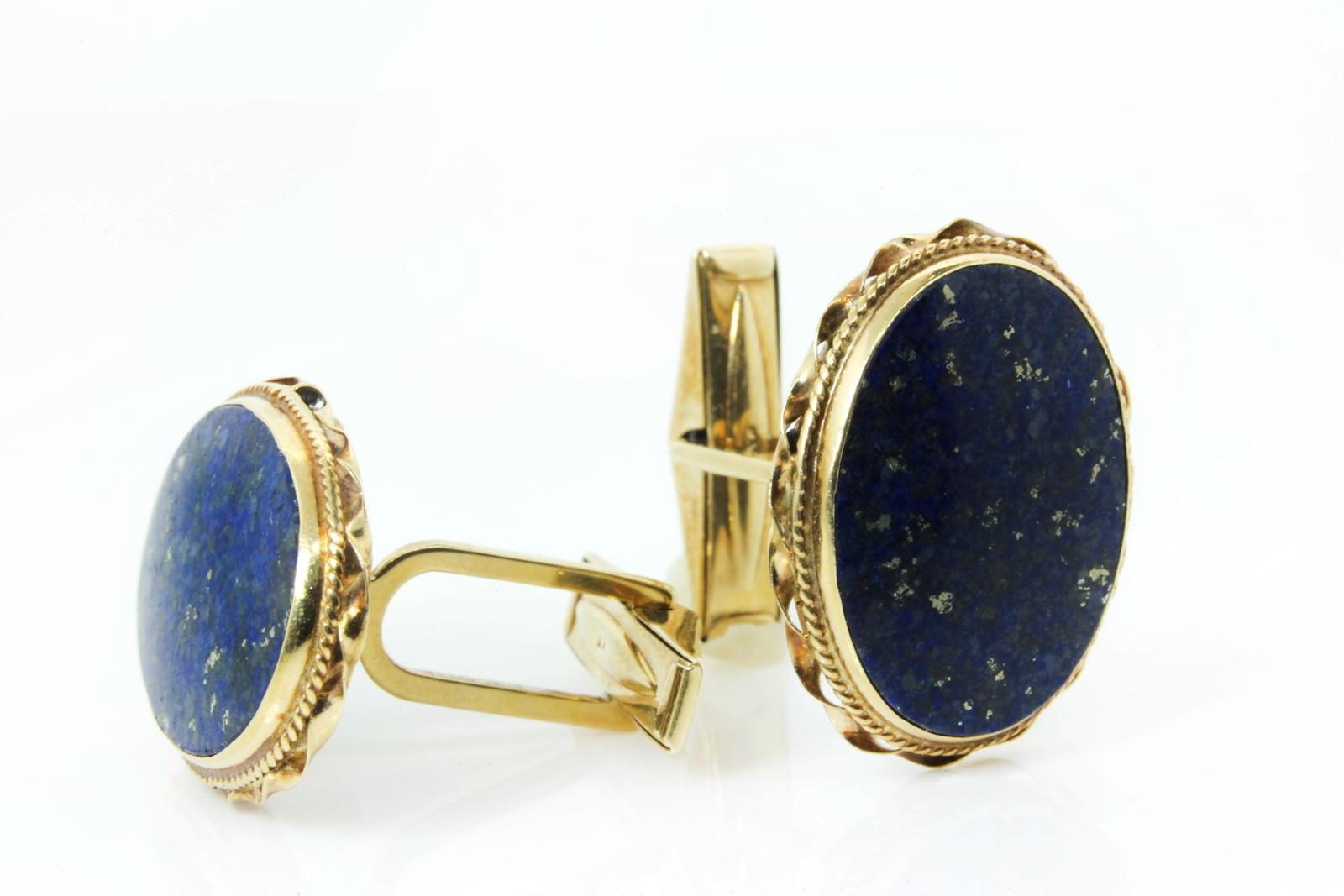 A pair of 1960s oval cut Lapis Lazuli 14KT yellow gold cufflinks.   The natural gold flecks bleed through the Lapis giving a special sparkle.  A ruffle border with delicate milgrain adds a special touch to the 7/8