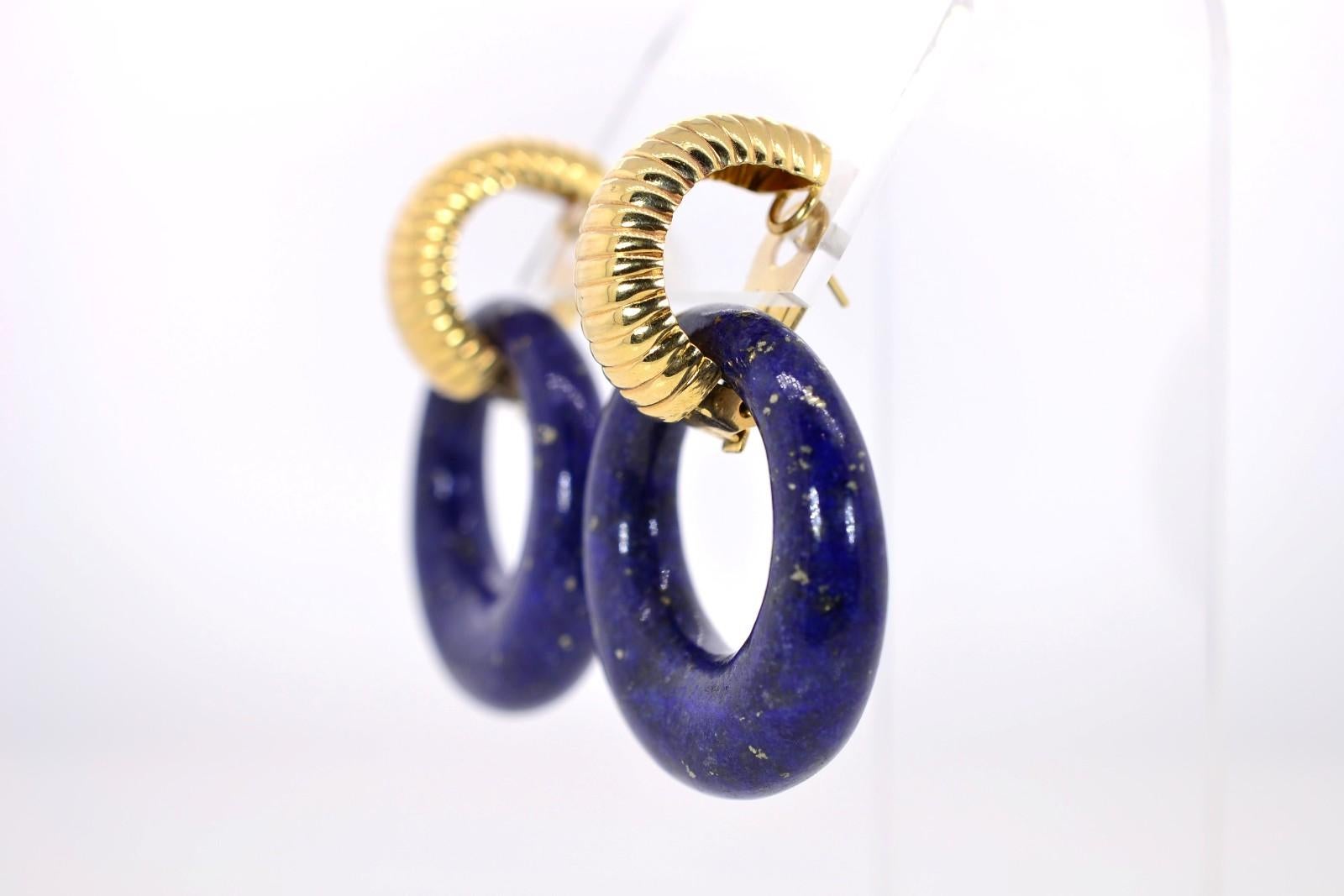 Fabulous and versatile circa 1960s large Lapis Lazuli hoops.  The Lapis dangles from a 14KT yellow gold detachable 