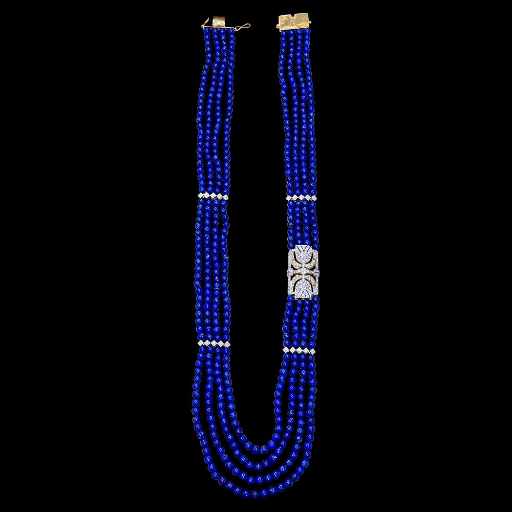 Vintage Lapis Lazuli Multi Strand Diamond Necklace 14 Kt Yellow Gold Clasp and a nice side broach with diamonds.
This marvelous vintage Lapis Lazuli  necklace features four row of luscious  Beads .
One side has a beautiful diamond clasp which is