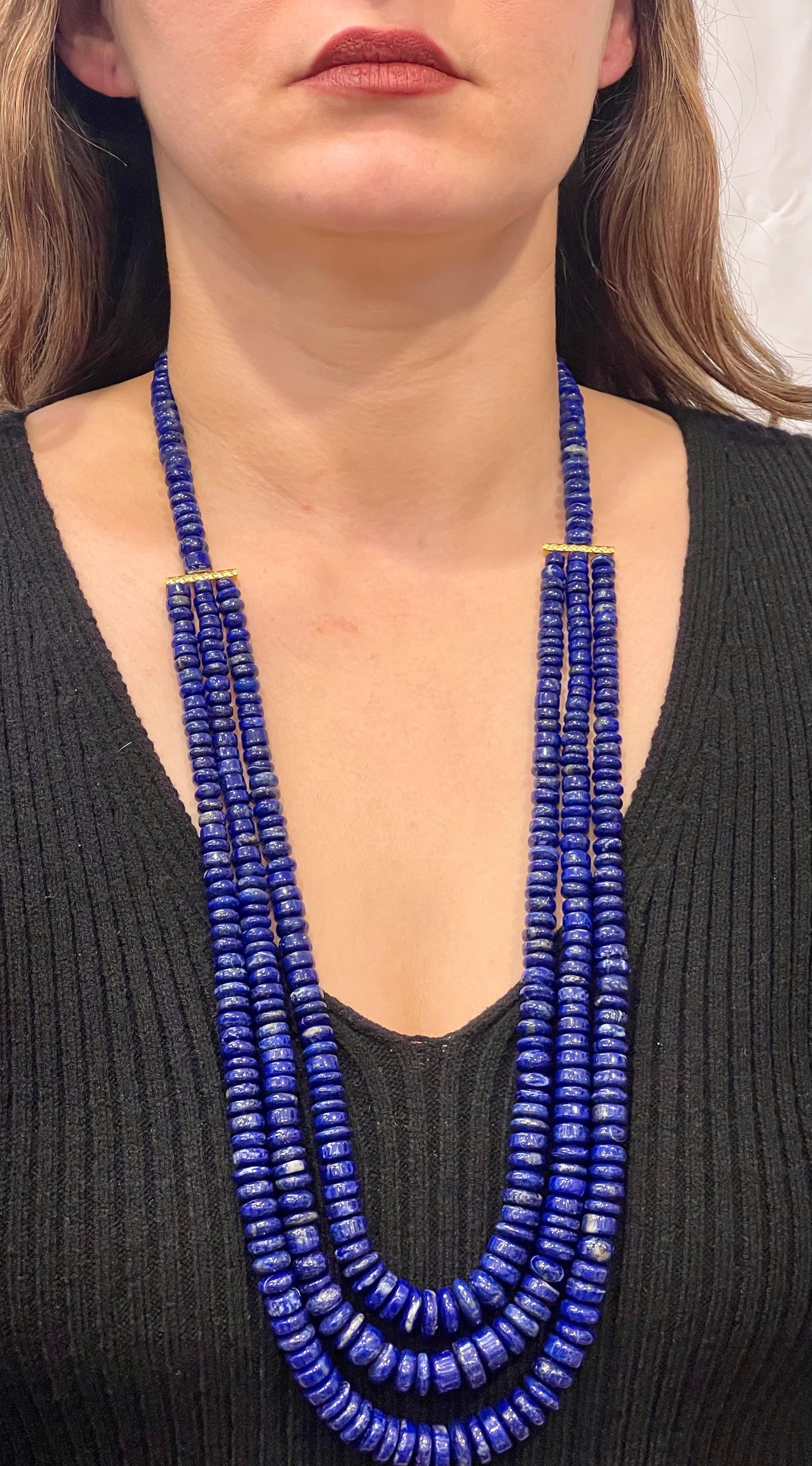  Vintage Lapis Lazuli Multi Strand Necklace 14 Kt Yellow Gold , Three graduating rows
This marvelous vintage Lapis Lazuli Multi strand  beads  necklace features multiple row of luscious  Beads
No clasp as its big enough to go thru over the