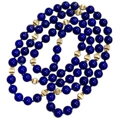 Vintage Lapis Lazuli Single Long Strand Necklace  with 14 Karat Yellow Gold Bead
