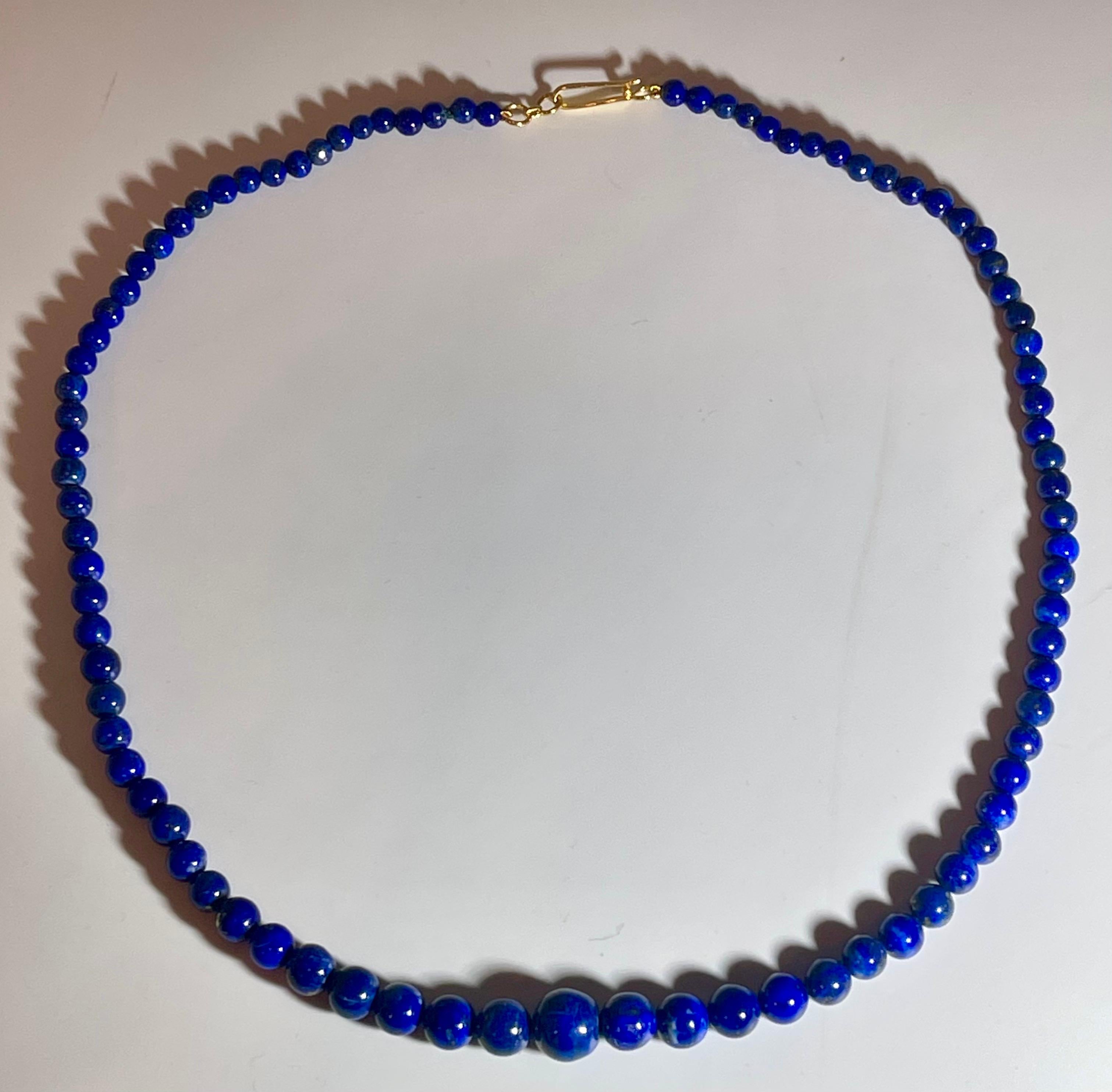 Round Cut Vintage Lapis Lazuli Single Strand Necklace with 14 Karat Yellow Long Hook Clasp For Sale