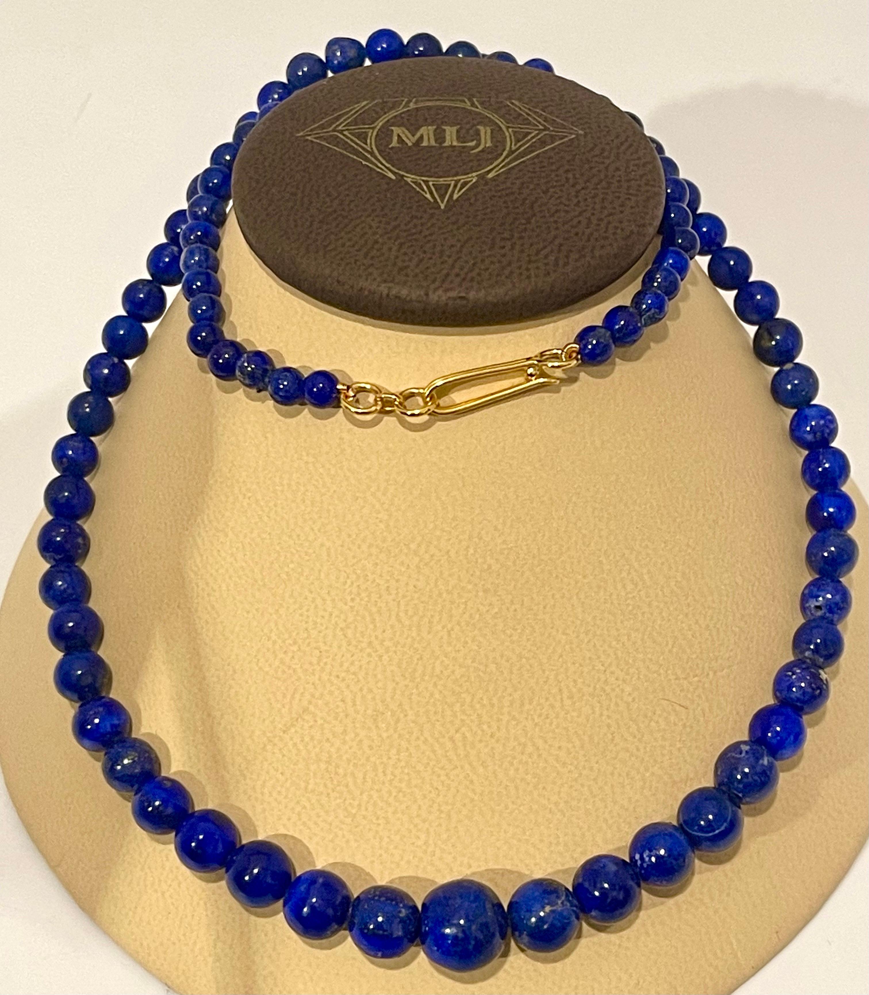 Vintage Lapis Lazuli Single Strand Necklace with 14 Karat Yellow Long Hook Clasp In Excellent Condition For Sale In New York, NY