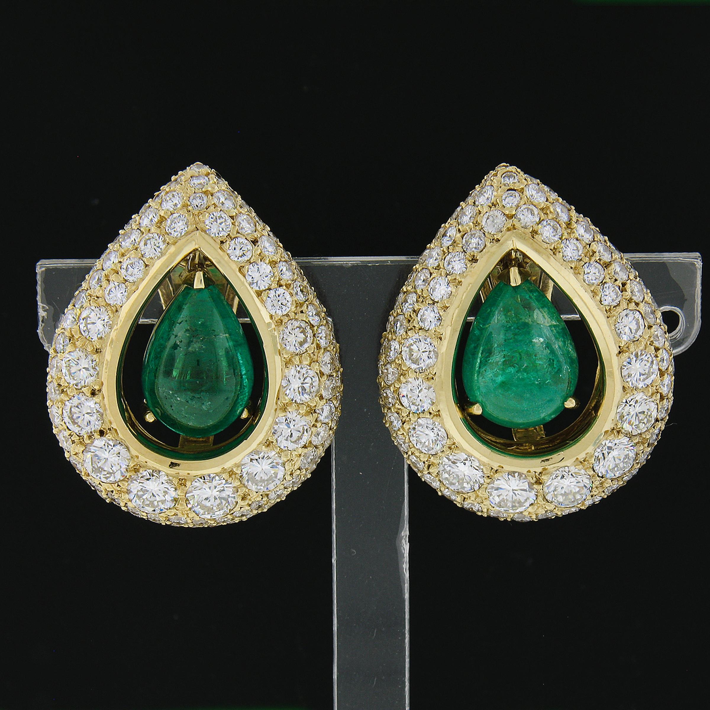 --Stones:--
2 Natural Genuine Emeralds - Pear Cabochon Cut - Prong Set - Vibrant Green Color - 8ctw approx.
** See Certification Details Below for Complete Info **
312 Natural Genuine Diamonds - Round Brilliant Cut - Pave Set - G-I Color - VS2-SI2