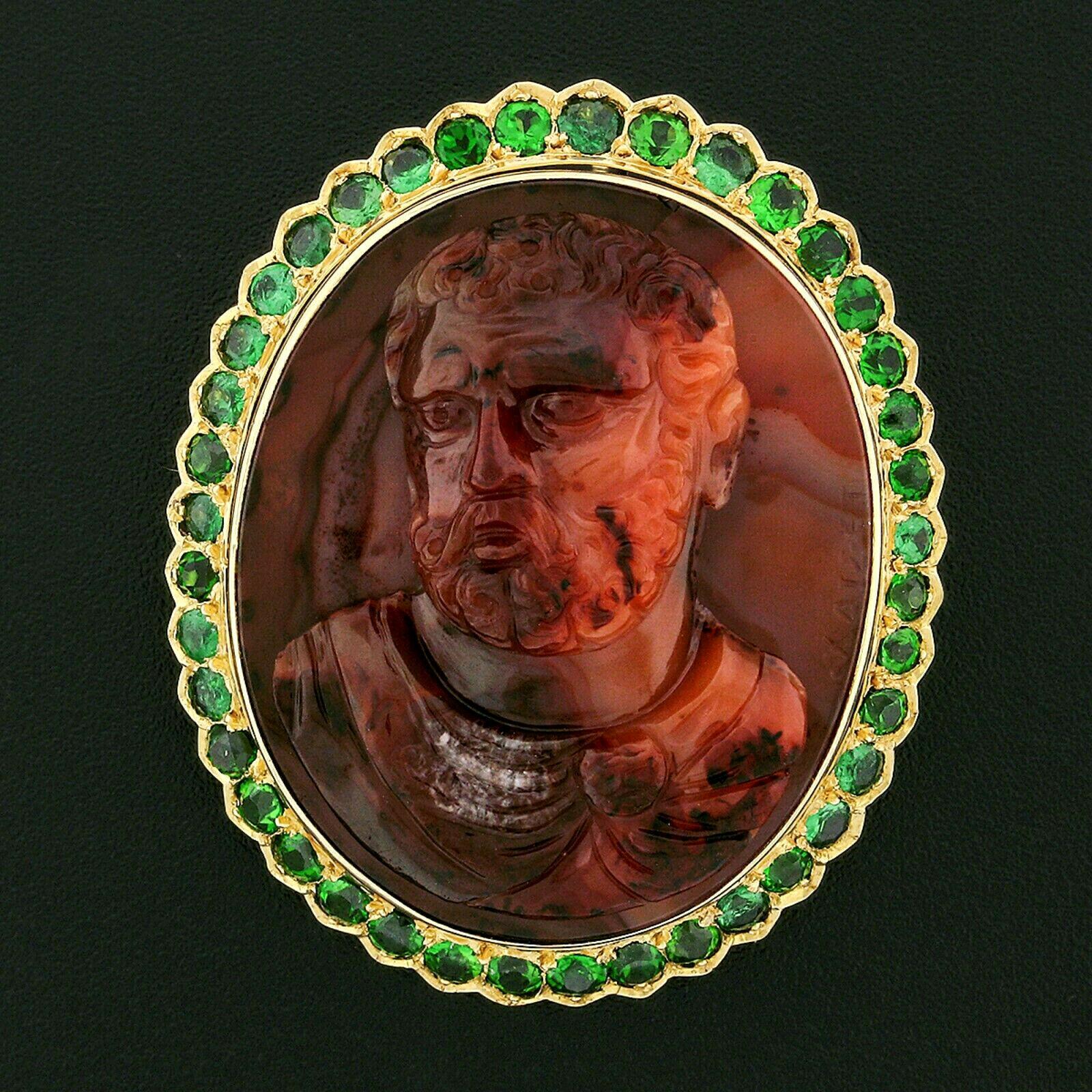 Here we have a large and unique vintage pendant or brooch that was crafted from solid 18k yellow gold. The pendant features a magnificent carved agate cameo of a man in a toga with short hair and matching beard. The carving is surrounded by a halo