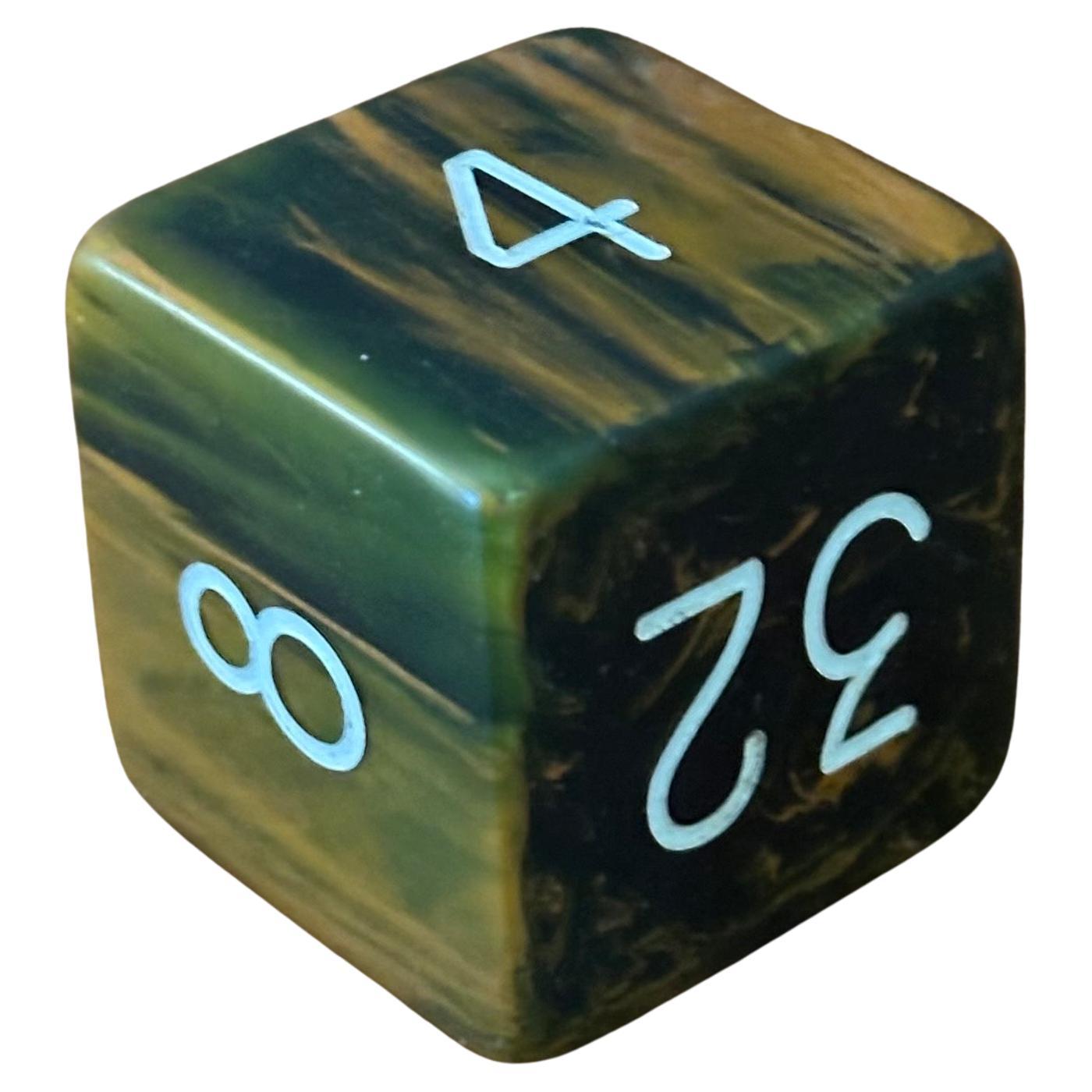 Gorgeous and very hard to find oversized bakelite backgammon doubling cube, circa 1930s.  The piece is in very good vintage condition and measures a substantial 1.5