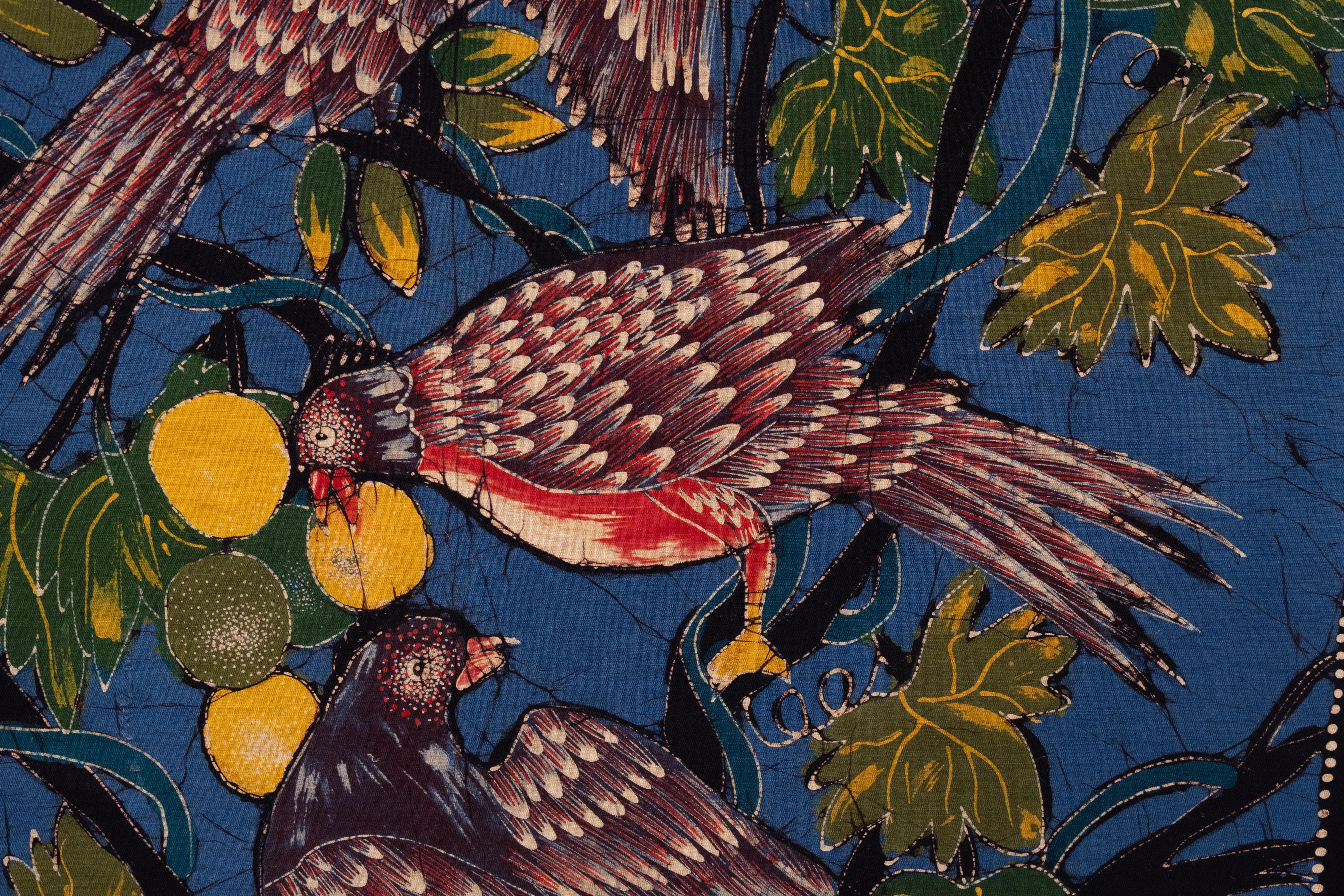 Love this Batik painting ,suberb color . looks like a Matisse painting . 
Parrots eating fruit . 1960s 
