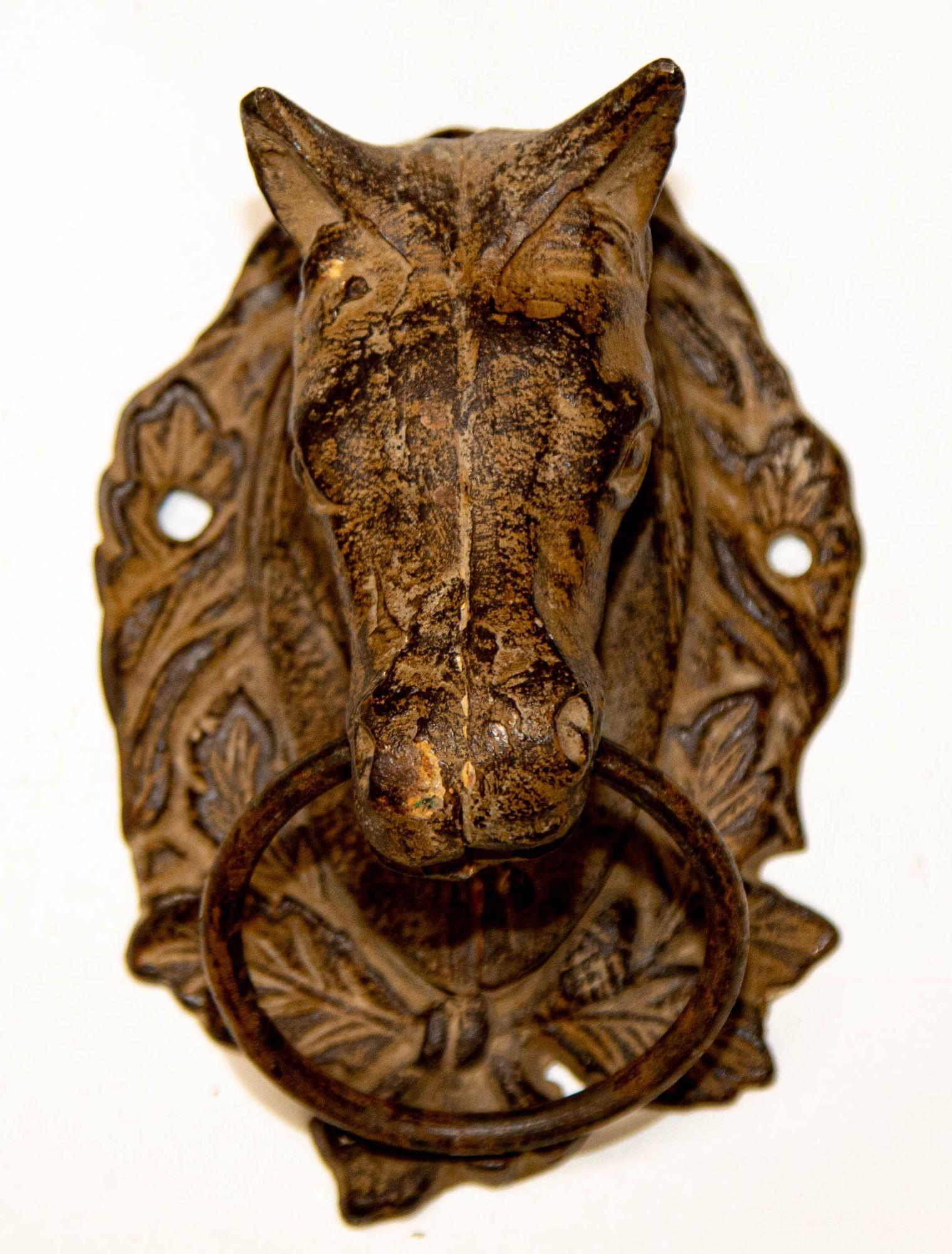 Vintage Large Cast Iron Horse Head Towel Wash Cloth Rag Ring Hook Hanger Wall Mount.
Metal horse heads with ornate ring used as towel holder, door knocker or for just an equestrian decor.
Cast Iron Horse Door Knocker, Equestrian wall Decor or Front