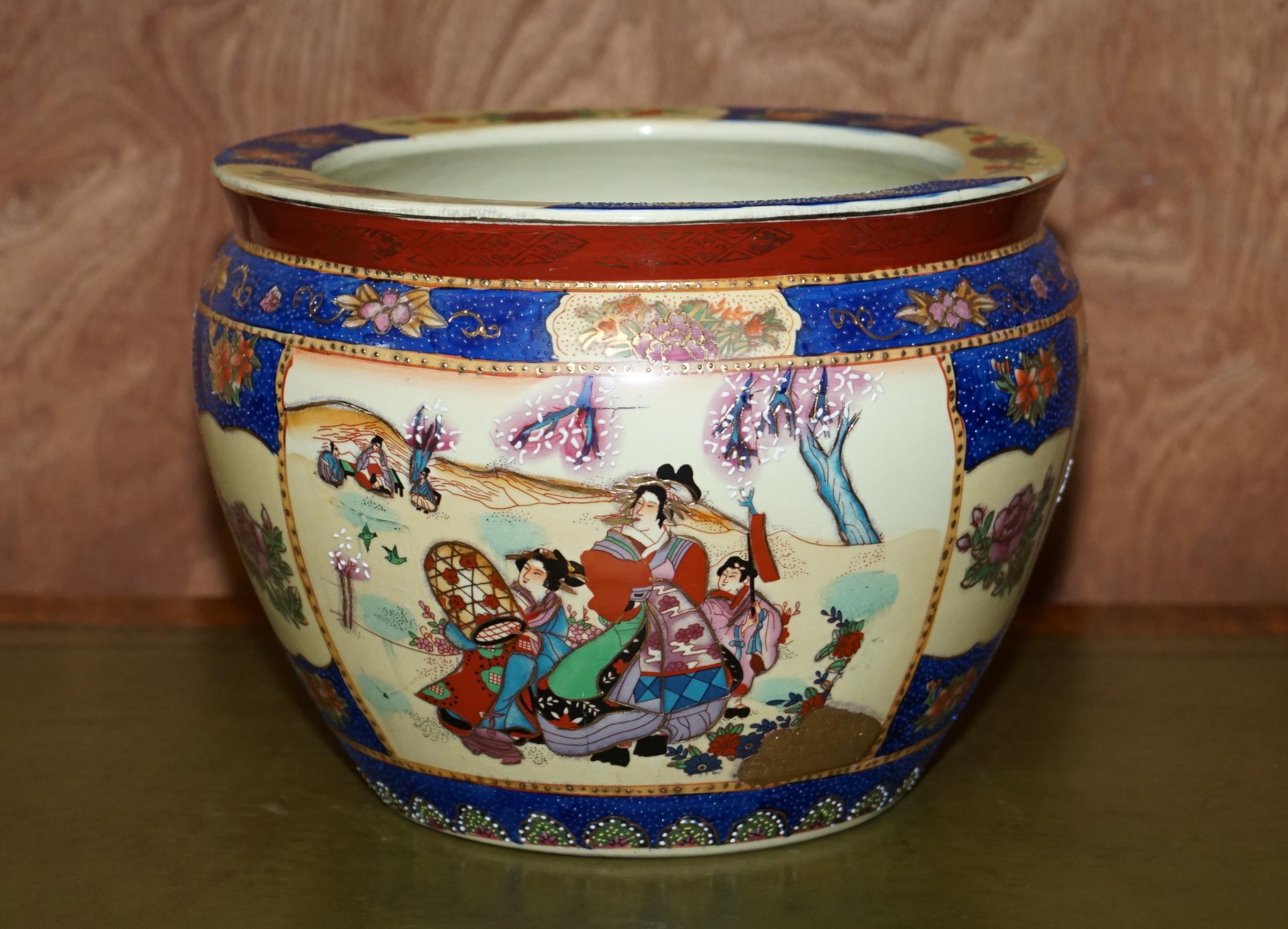 We are delighted to offer for sale this lovely Vintage Chinese Export Satsuma Moriage Geishas Koi Fish Bowl 

A very good looking well made and decorative piece, ideally suited for pure decoration or as an actual fish bowl! This piece really