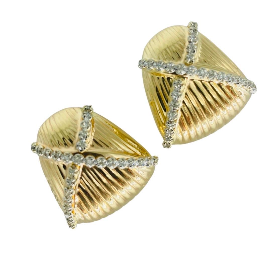 Vintage Large Designer 1.00 Carat Diamonds X Design Omega Clip Back Earrings 14k Gold. Unique by designer stamped CIG 49437. The earrings measure 29mm and weight 10.9g
The earrings features round cut diamonds totaling 1.00 carat weight. The earrings