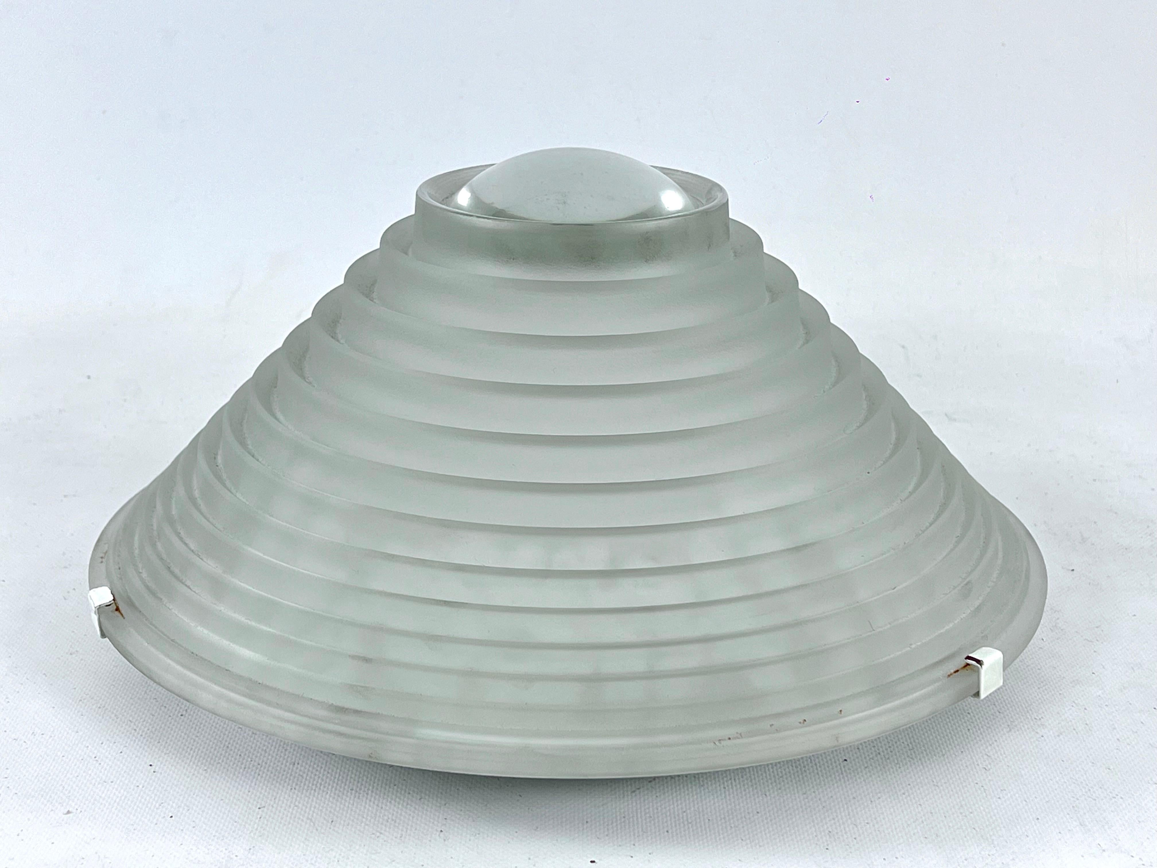 Great vintage condition with normal trace of age and use for this Large Egina 38 ceiling lamp designed by the Italian architect Angelo Mangiatotti for Artemide and produced during the 70s. Made from thick frosted glass shade on white metal frame. No