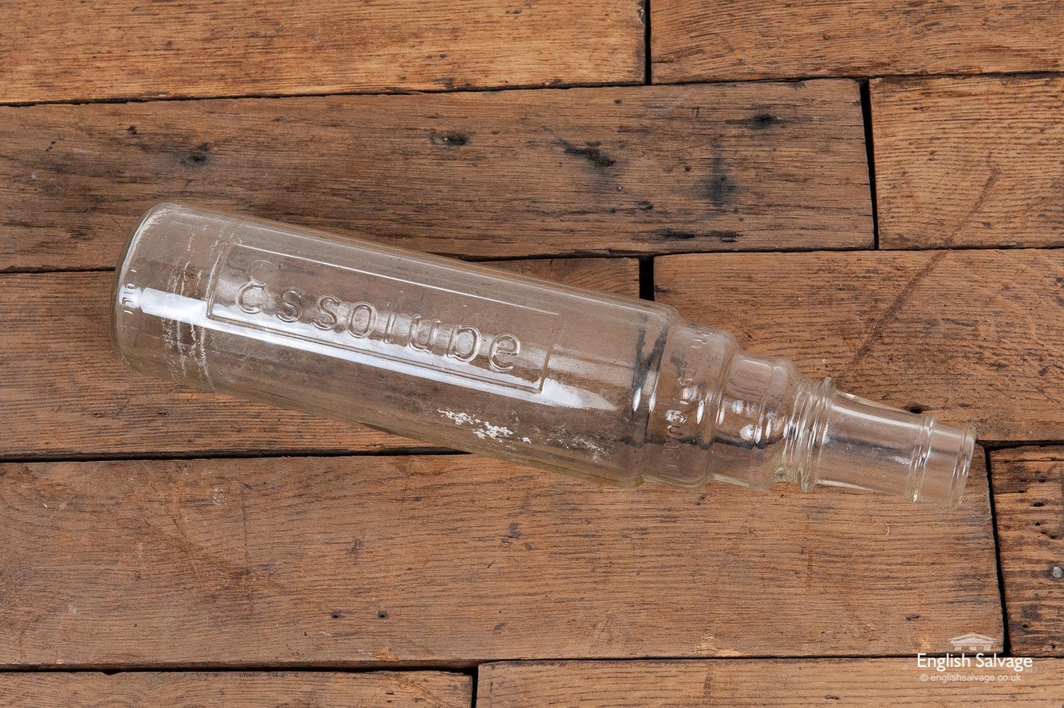 Large and tall 1 Quart Essolube glass bottle. Great piece of vintage automobilia for the collector or would make a great display item in a garage or workshop. Some marks to the inside commensurate with age and use. Base is marked Reg No 781642 K 21