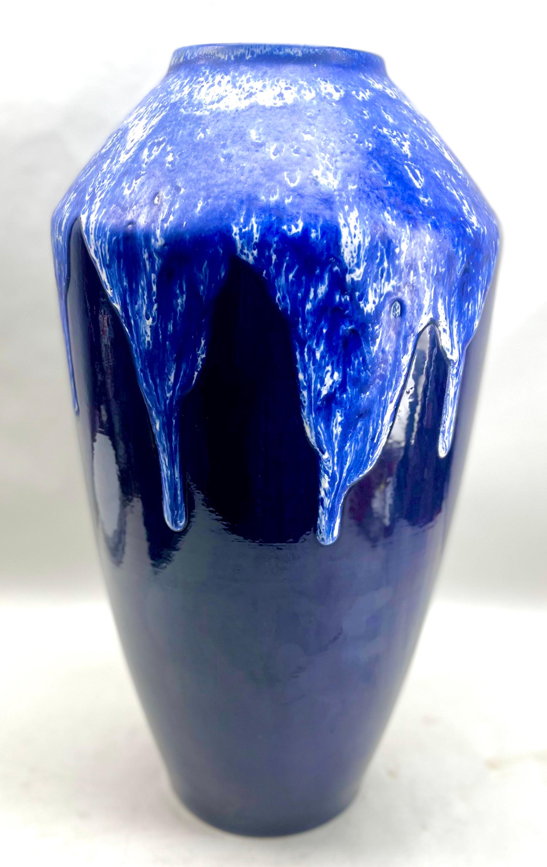 Vintage Large Fat Lava Floor Vase with Cobalt Blue Drip-Glaze 88-40 W-Germany'

Large Bay W Germany
Classic fat lava Cobalt Blue drip-glaze Floor vase 
Glazed pottery.
Stamped on the base. 540-48 W-Germany.
Measures: 50 x 26 cm 

The piece is in
