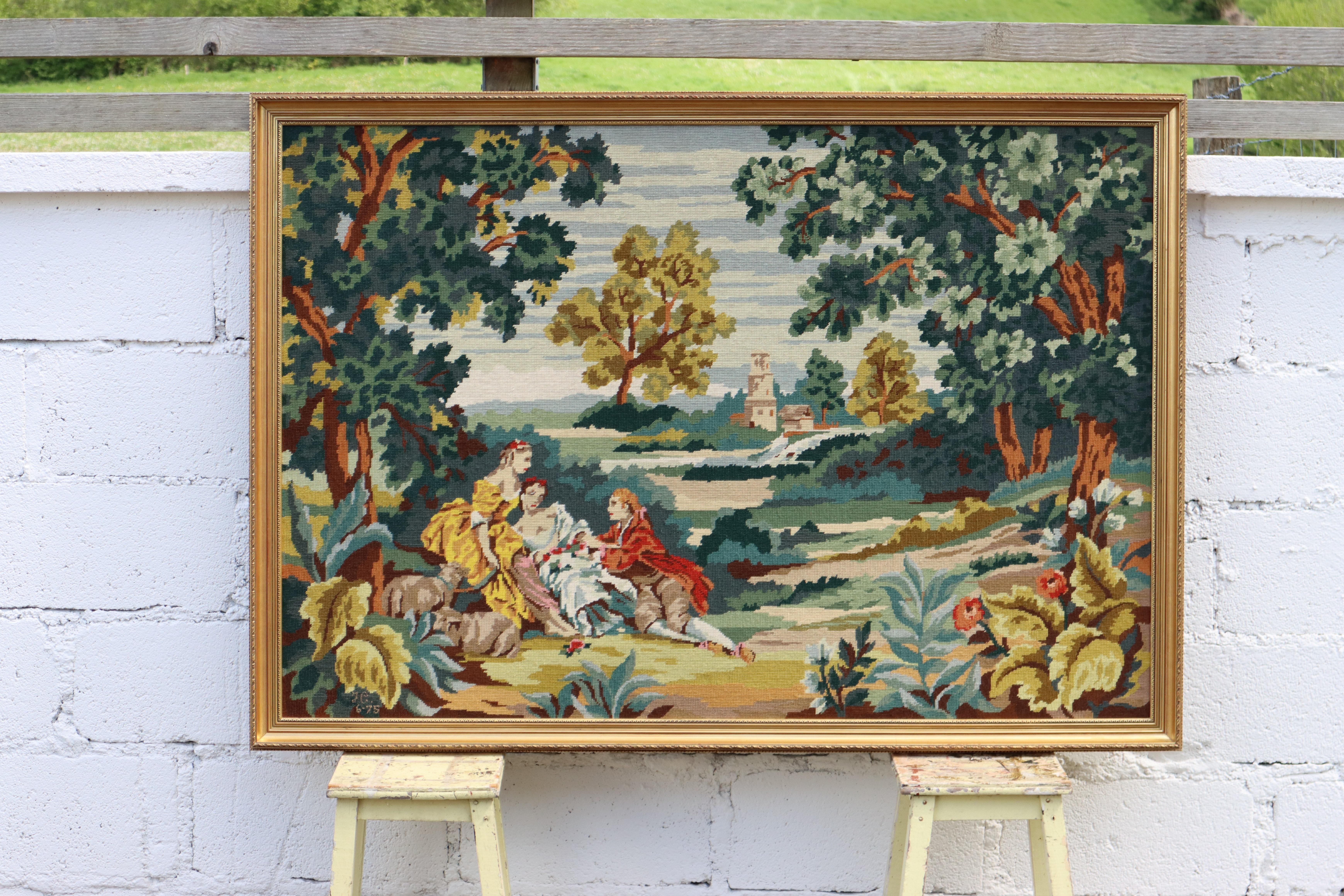 Perfectly crafted Artwork from the 70s in a magnificent golden Frame.
Wonderful detailed Baroque Motif -Depiction of a traditional Spring Party Scene .
The Tapestry is attached to a wooden Frame , the back is covered with dark green Satin Fabric.
A