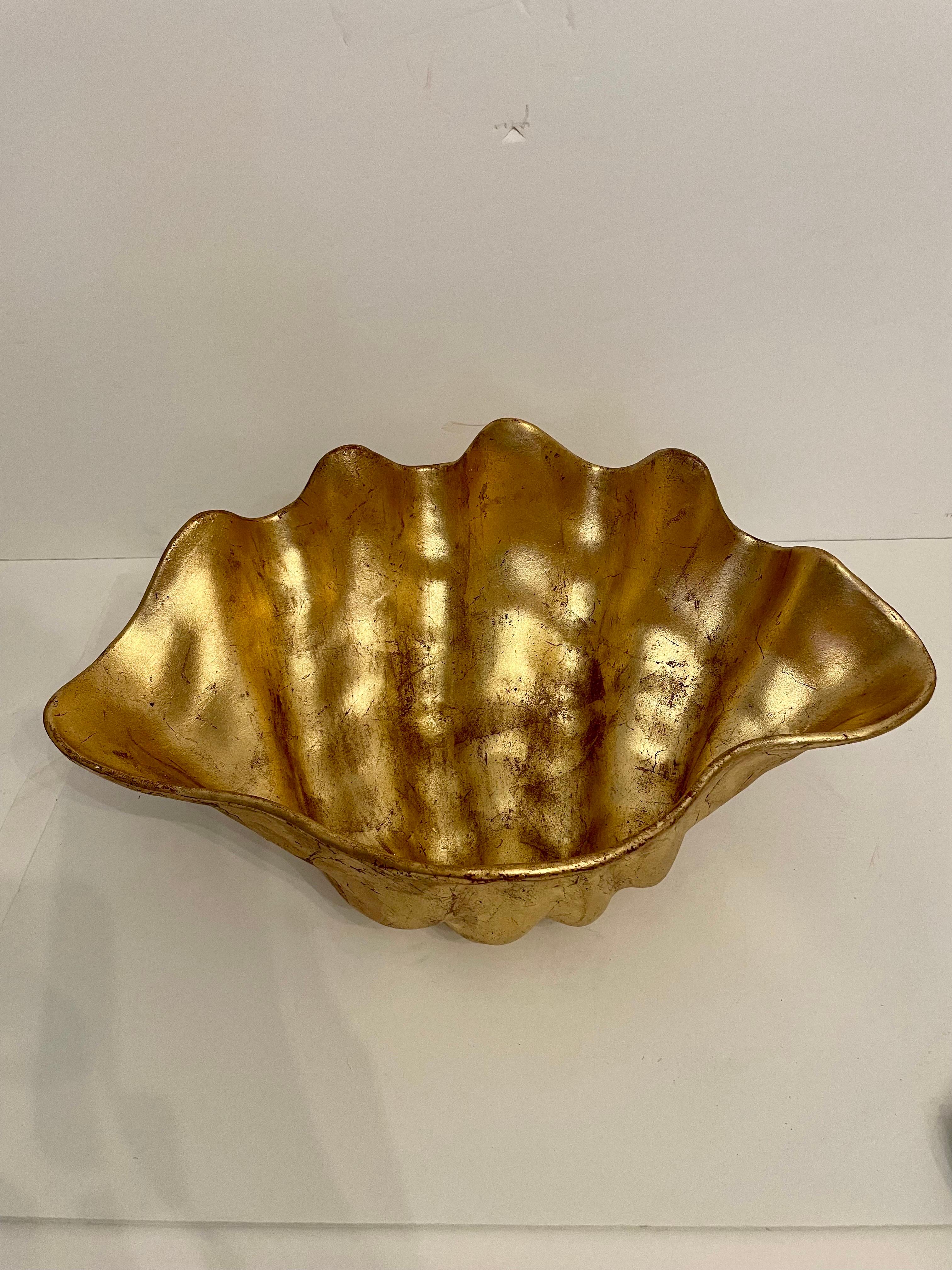 Large Hollywood Regency vintage gilt finish sea shell bowl. Nicely detailed. Good condition with some patina from age and use. Measures 18 