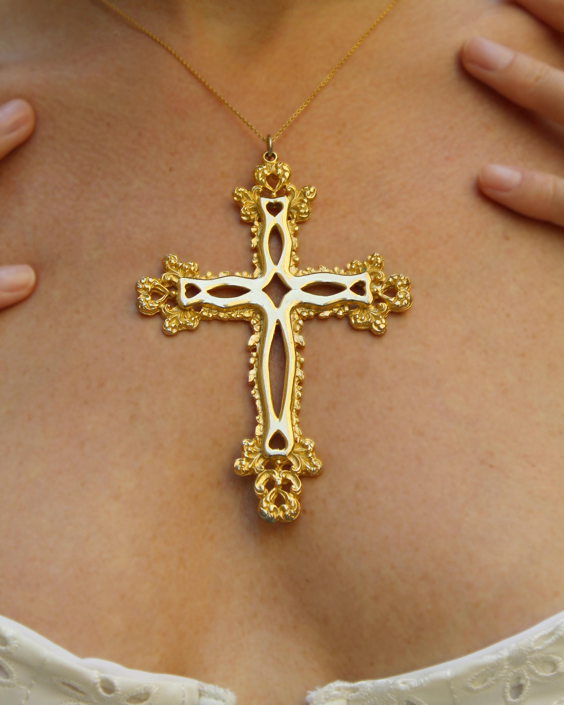 This utterly huge vintage gold cross is such a statement piece— it's giving vintage Dolce & Gabbana vibes, and I'm here for it. It features sculptural baroque details and cutouts, giving it an old-world feeling. The pendant is sold individually, but