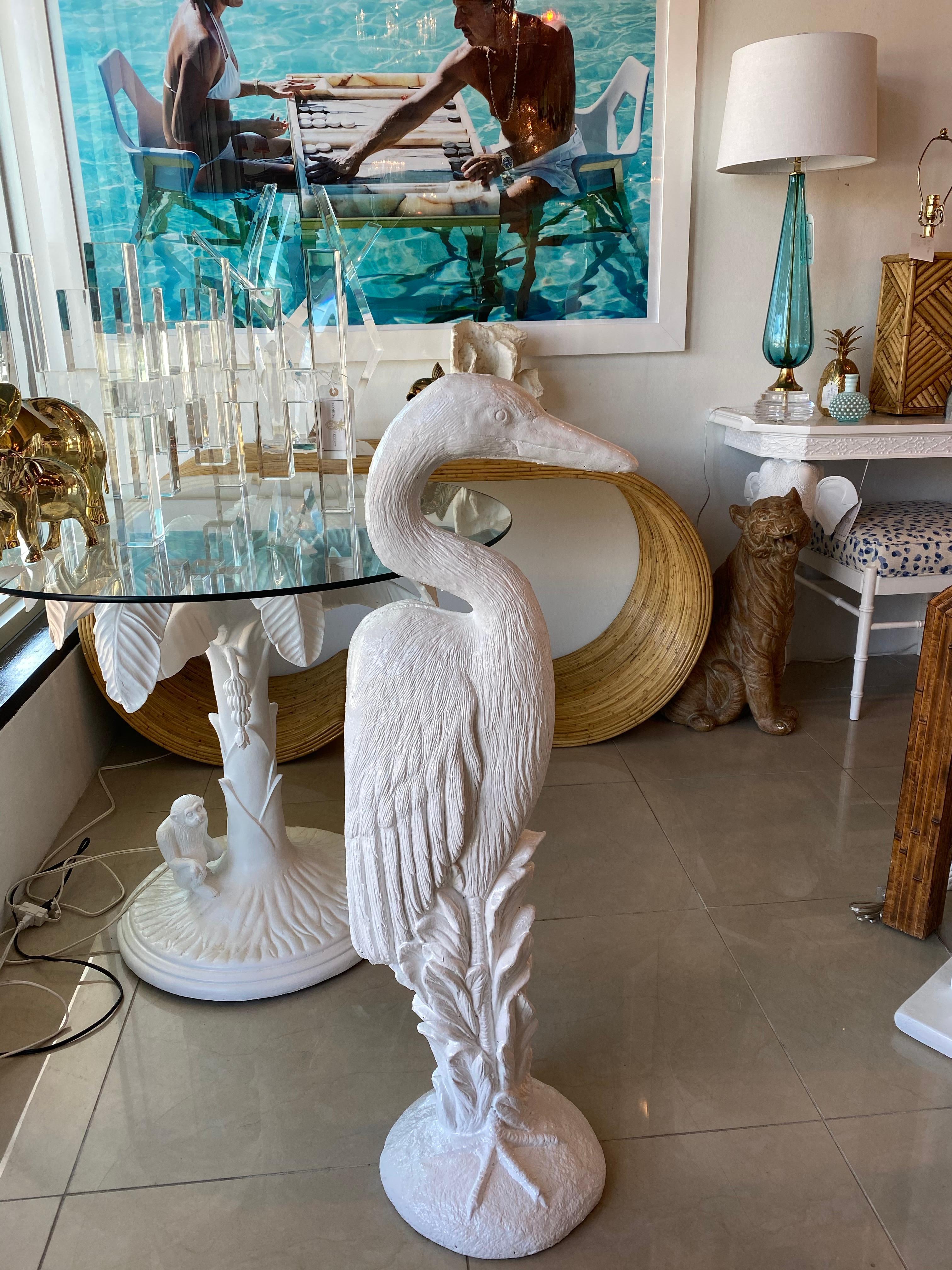 Lovely vintage heron bird concrete statue. Done in a gloss white which makes him perfect for inside, outside or a porch.