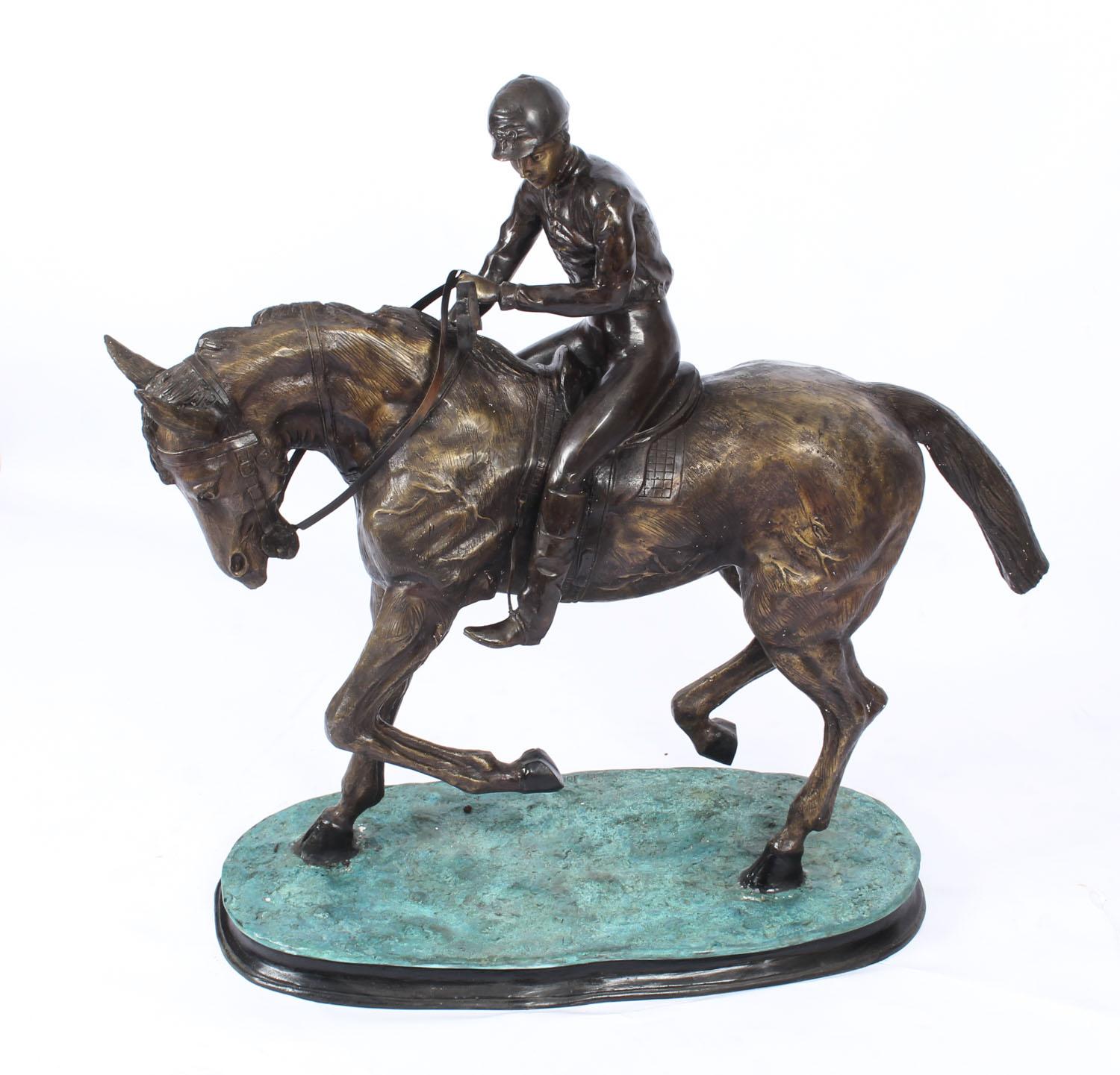 This is a stunning large bronze sculpture of a horse and jockey after Pierre Jules Mene' and dating from the second half of the 20th Century.

The stunning sculpture has detailed definition, features the horse and jockey in action and has a deep