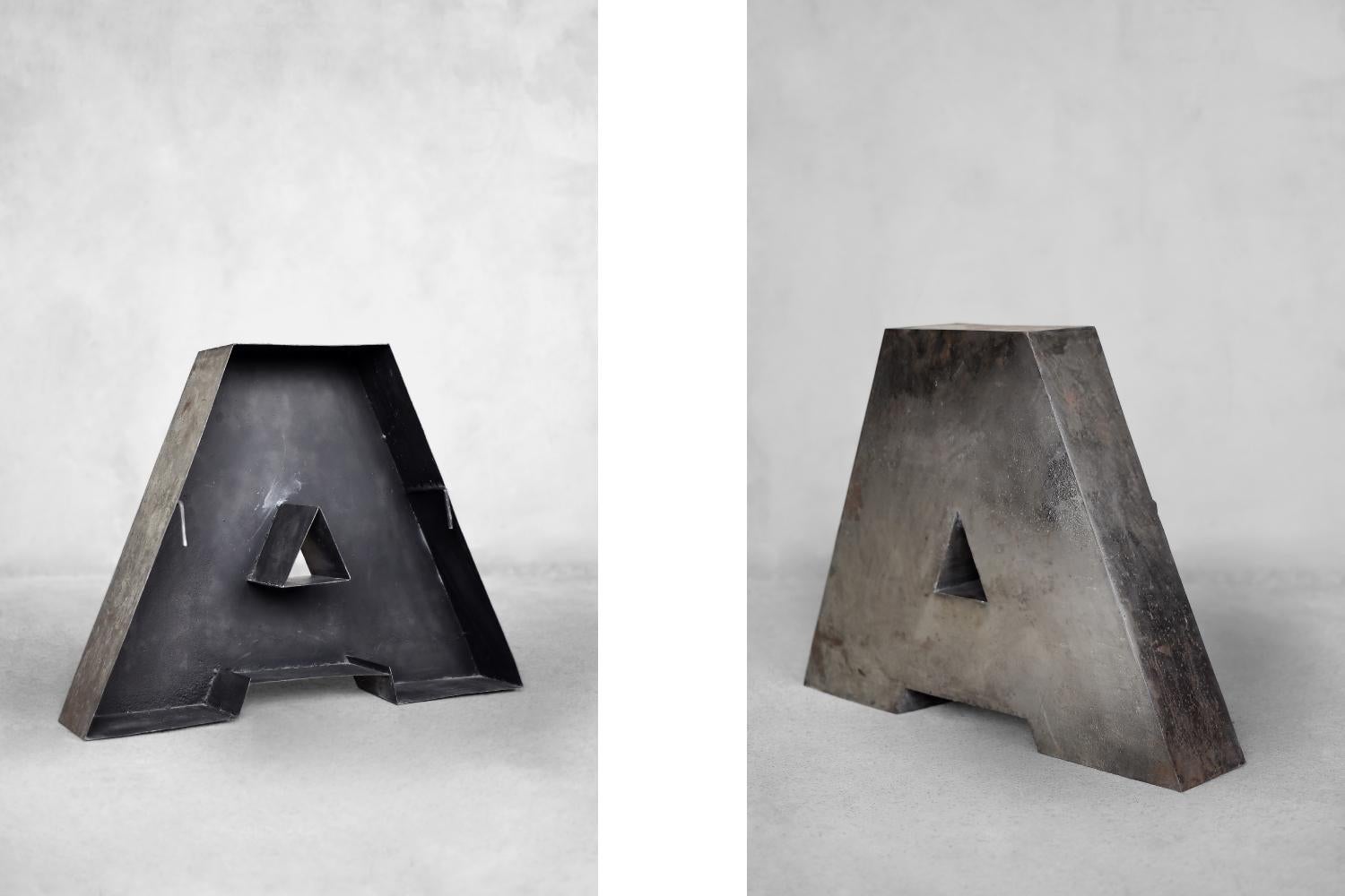 This large, spatial letter A was produced in Poland during the 1950s. It was made of metal. It is an original element of the sign of a former restaurant in Poland, which was exposed outside, hence traces of natural patina. The three-dimensional