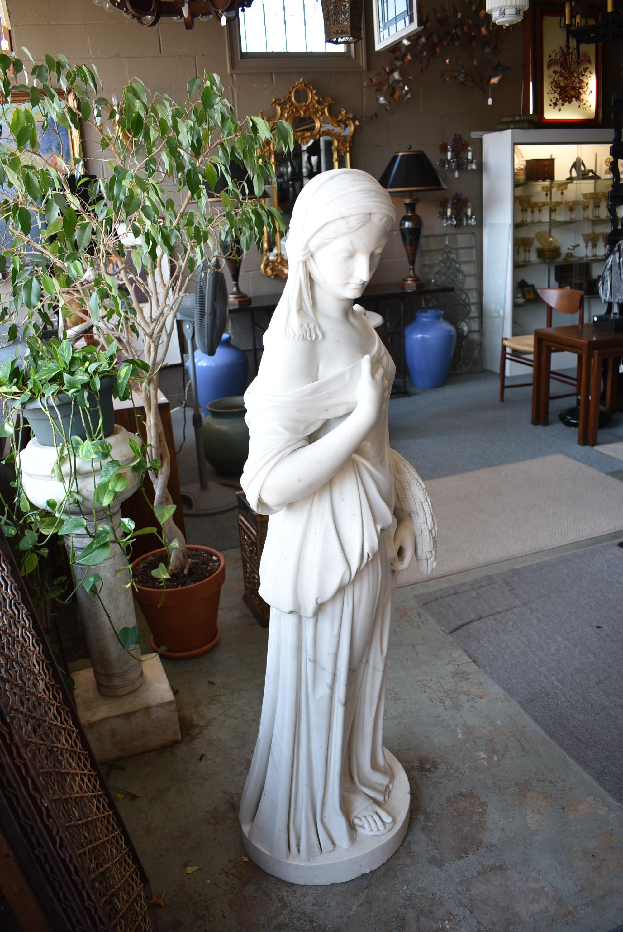 Turn-of-the-century to 1920s beautiful vintage Italian marble figural sculpture of a young woman depicted as the season of summer. This detailed sculpture would make an amazing garden focal feature or use inside as a statement piece. This elegant