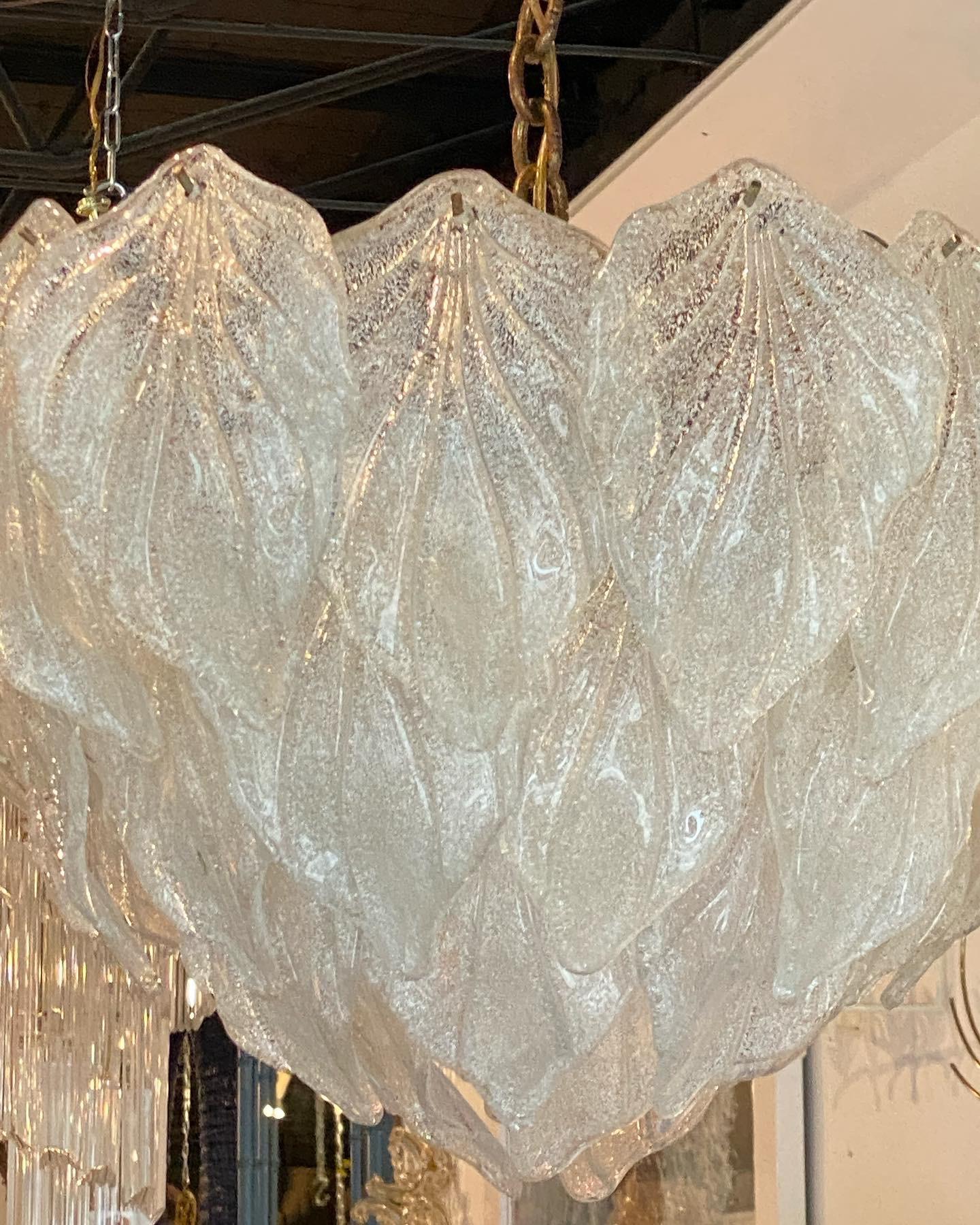 Lovely vintage Murano Mazzega by Carlo Nason leaf chandelier. Each leaf looks like it has spun pieces of sugar sprinkled on. No chips or breaks too leaves. Size is of chandelier only since the chain is adjustable. Comes with original ceiling cap and