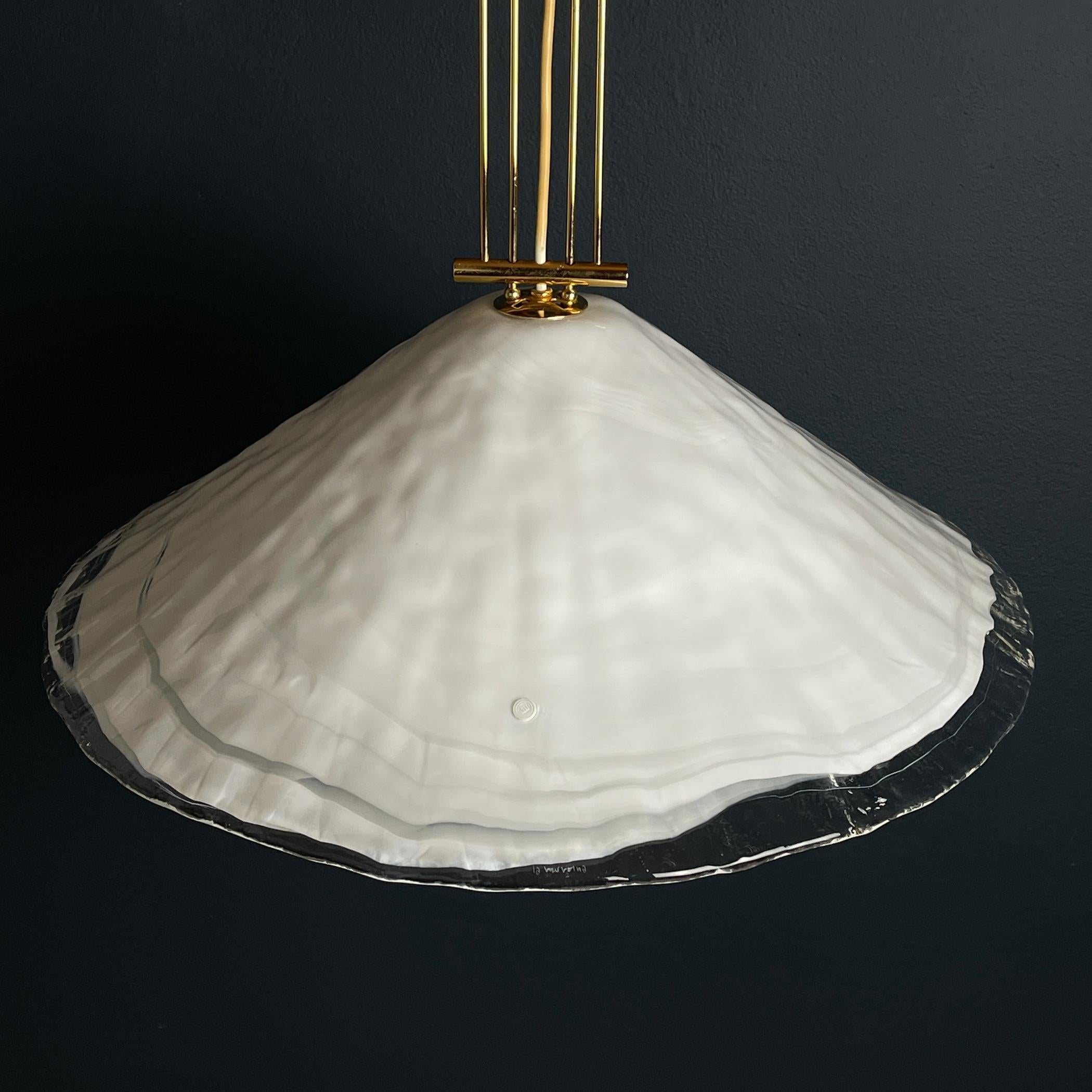 Illuminate your space with the timeless elegance of this beautiful vintage large Murano pendant lamp, a creation of the esteemed manufacturer 