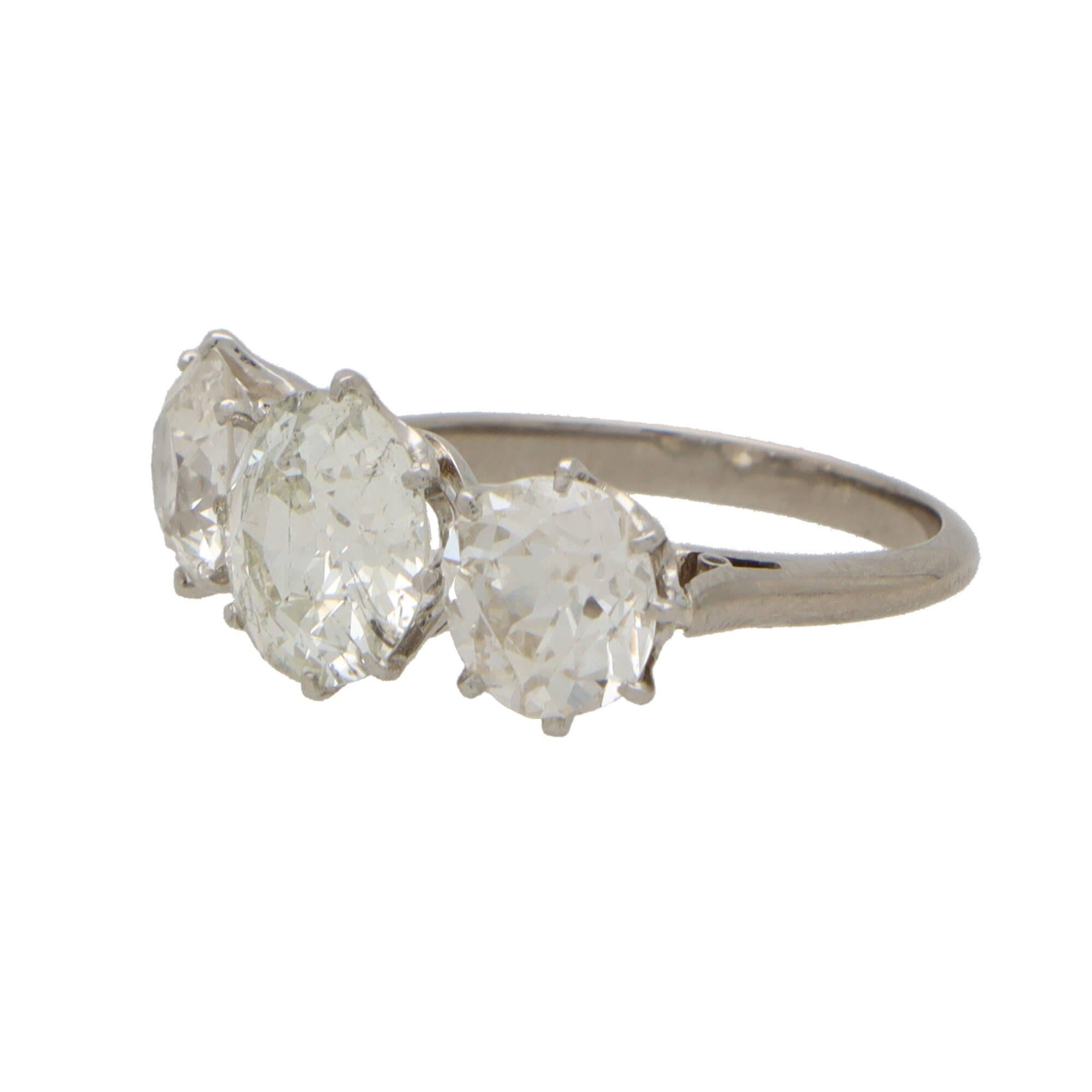 Late Victorian Vintage Large Old Mine Cut Diamond Three Stone Ring Set in Platinum For Sale