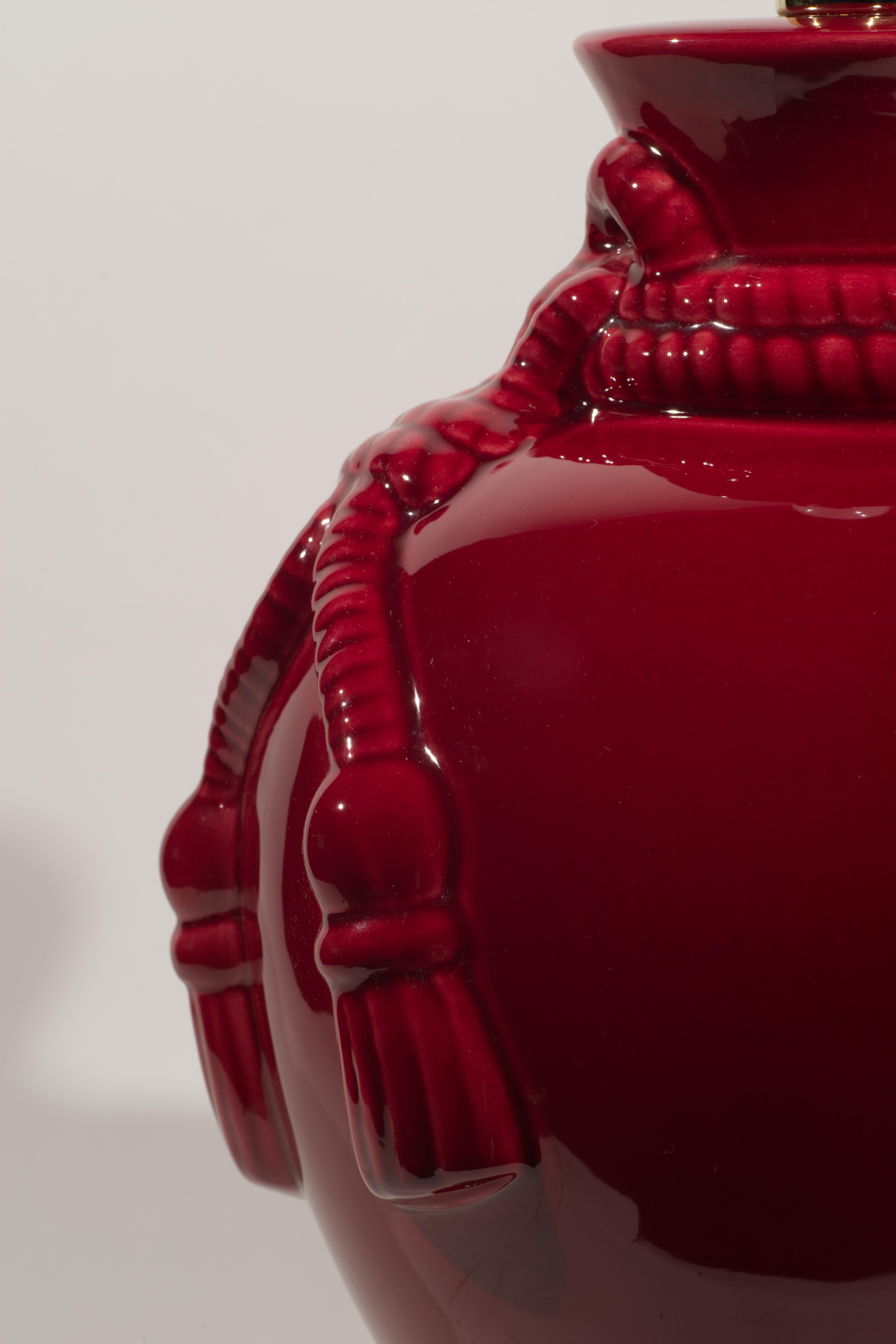 American Vintage Large Oxblood Red Ceramic Table Lamp with Tassel Relief For Sale