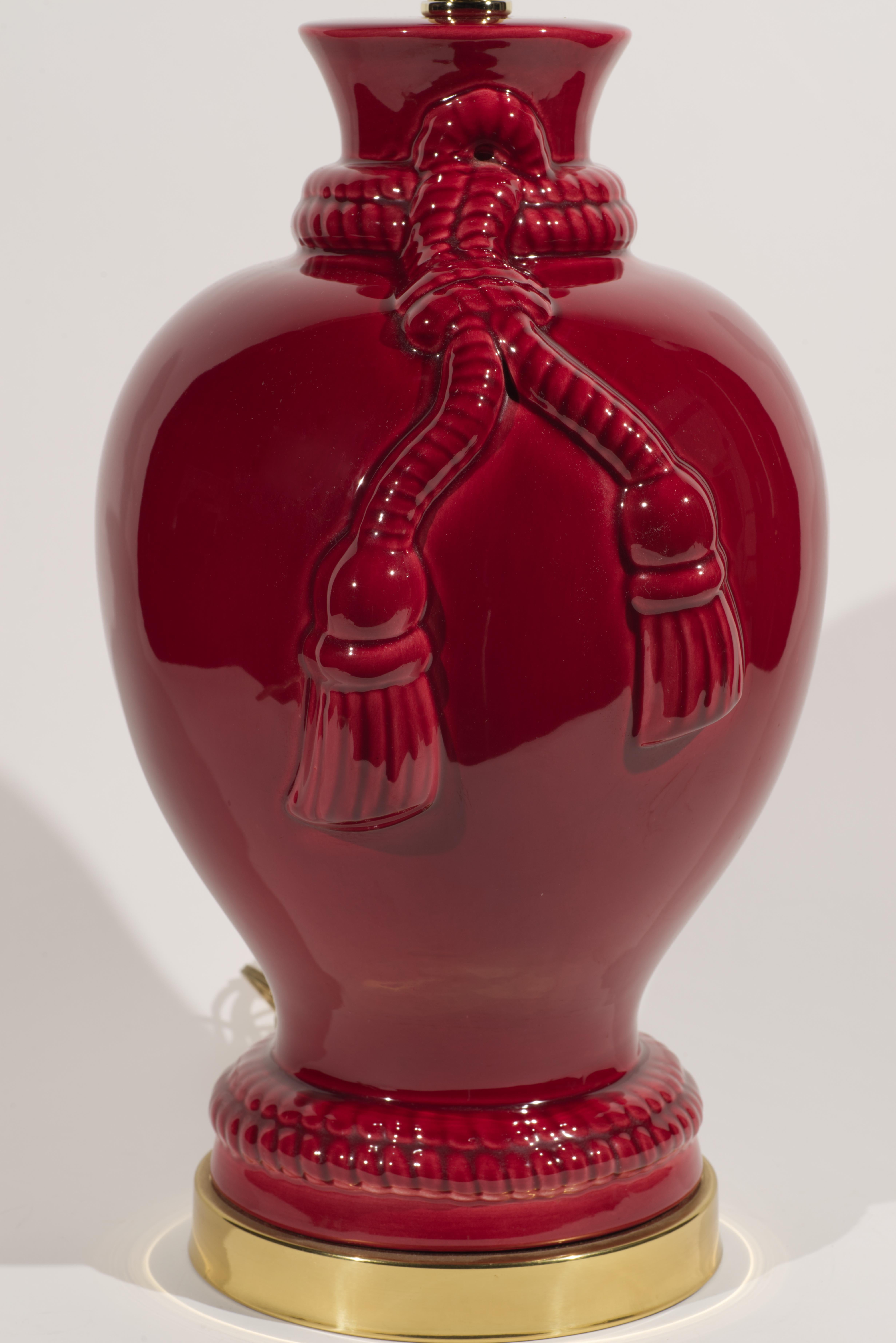 Glazed Vintage Large Oxblood Red Ceramic Table Lamp with Tassel Relief For Sale