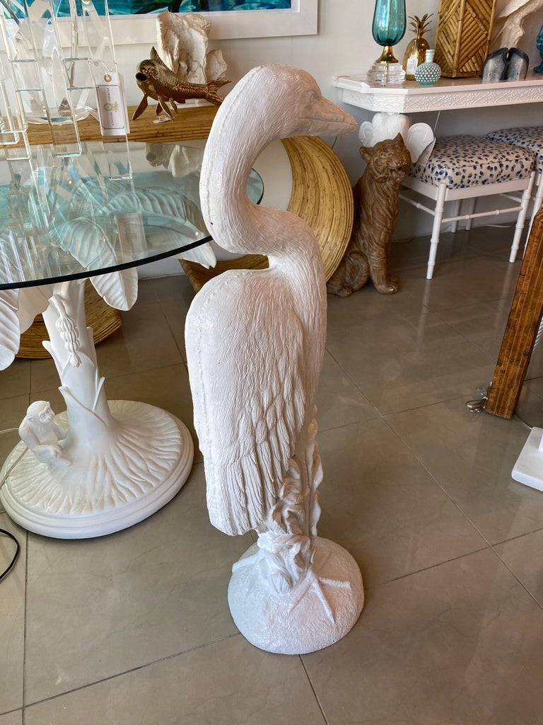 Lovely vintage heron bird concrete statue. Done in a gloss white which makes him perfect for inside or a porch. No chips or breaks. Last picture shows 