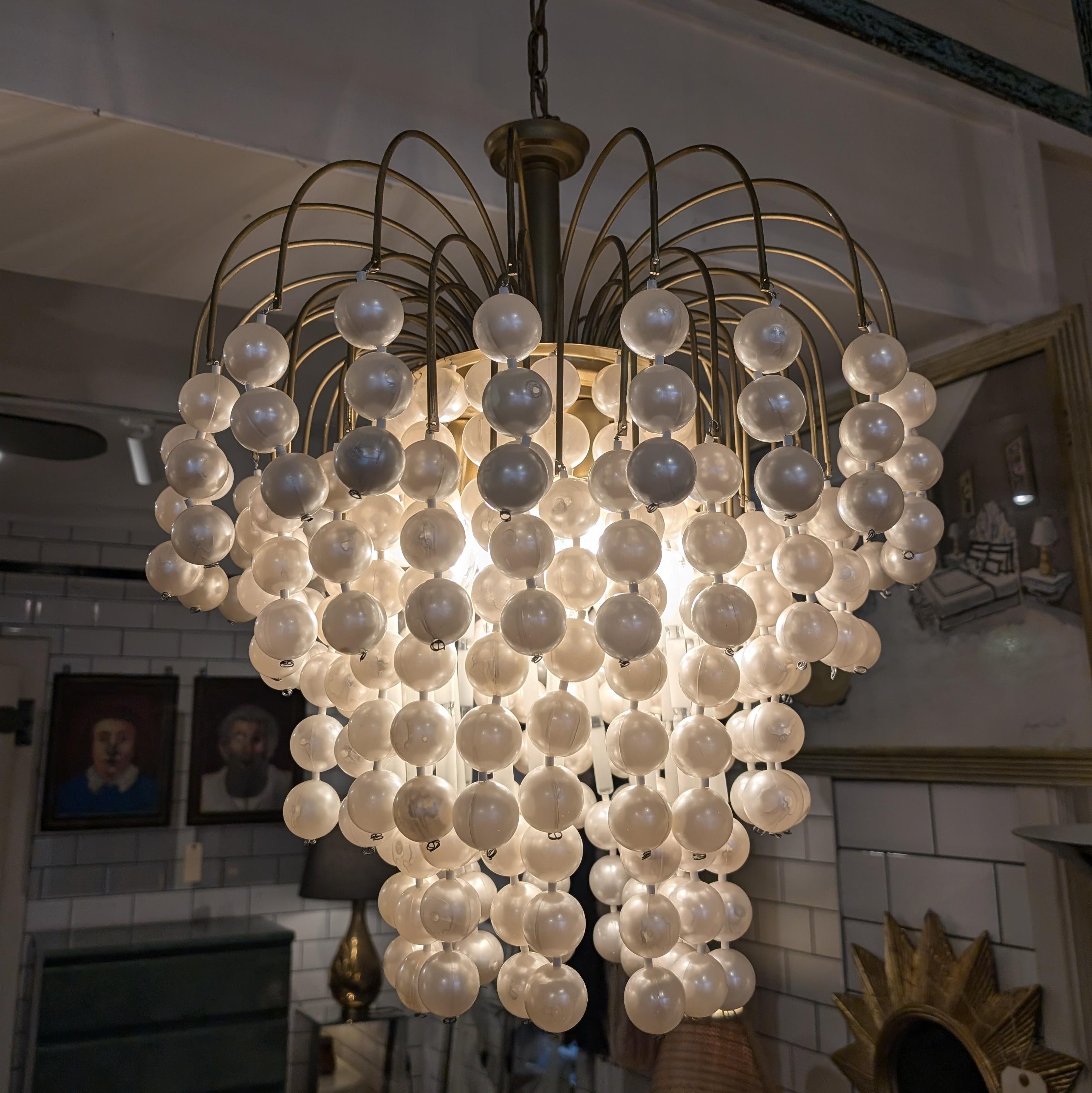 Amazing large pearl bubble waterfall chandelier, Verner Panton style. By Massive Lighting, Belgium, 1970s.
Strands of wired pearlised plastic balls hanging from a brass frame.
Newly rewired with braided cord, and ready to hang 

Dimensions: diameter