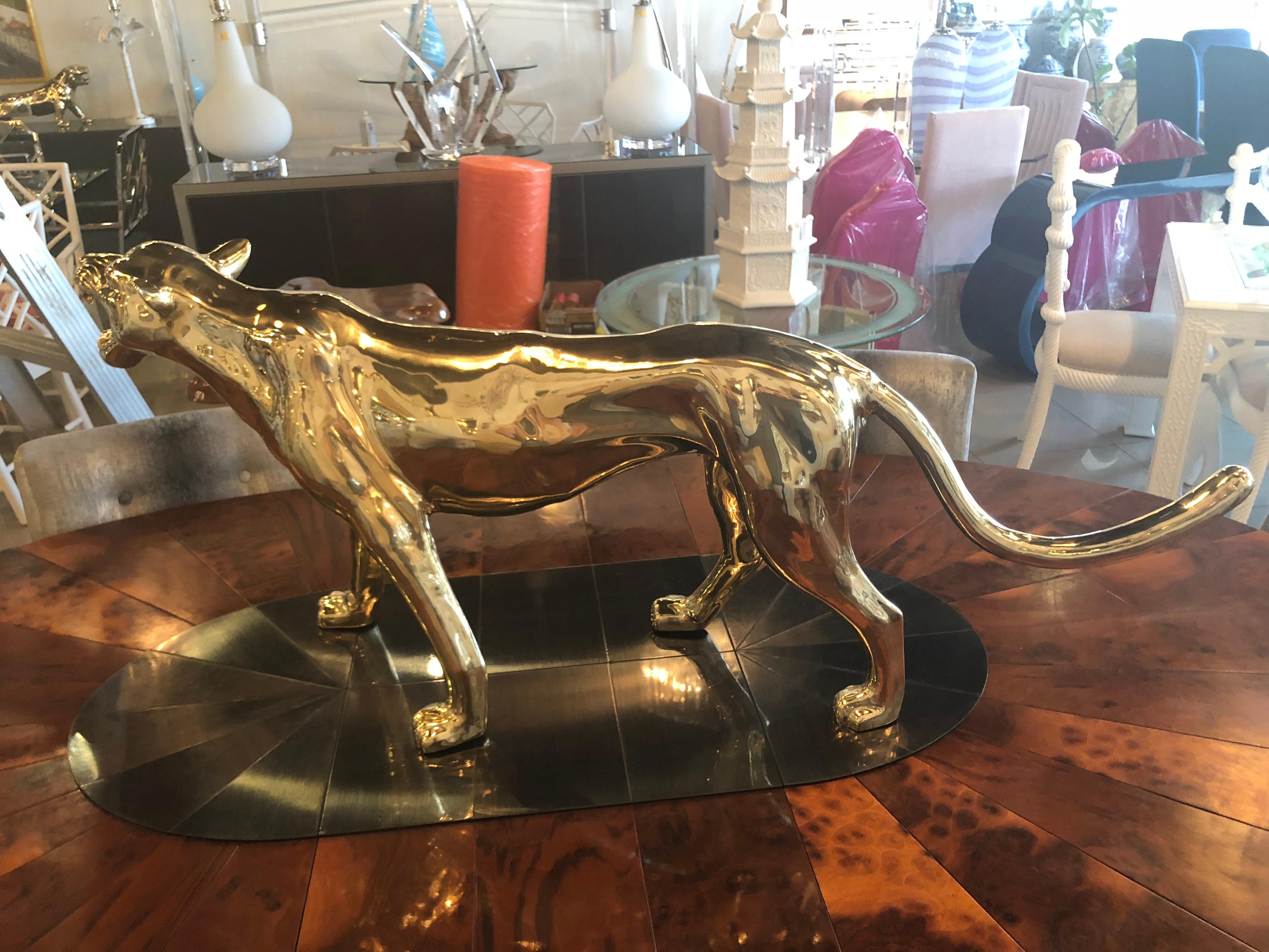 Vintage large panther tiger polished brass statue. This piece has been professionally polished.