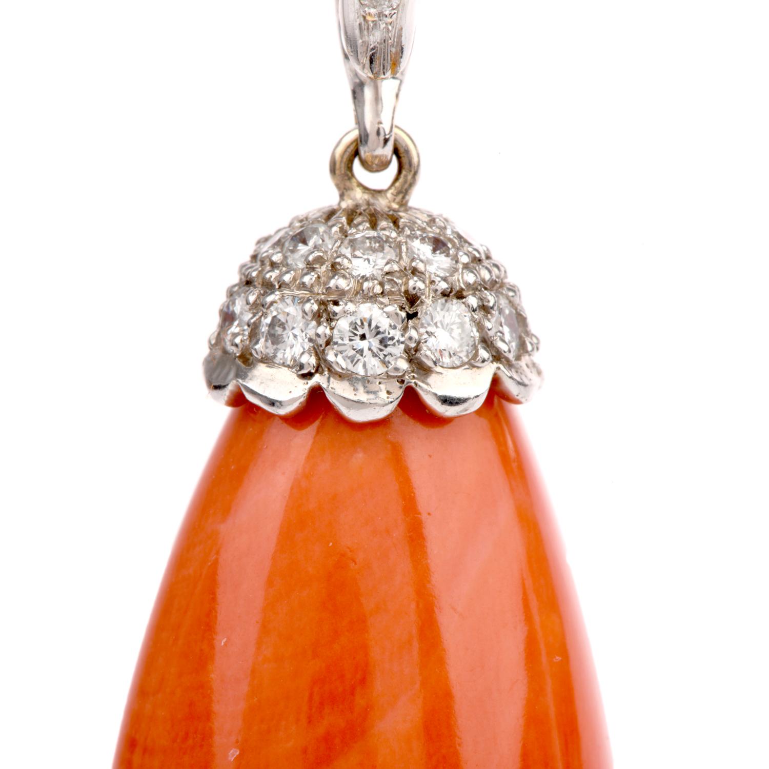 This sensual Red Coral piece was designed universally

as a Pendant or Enhancer.  This can easily be worn alone suspended on 

an elegant chain or opened and clipped around a strand of Pearls or your favorite

beads.  Crafted in 18K white gold.  The