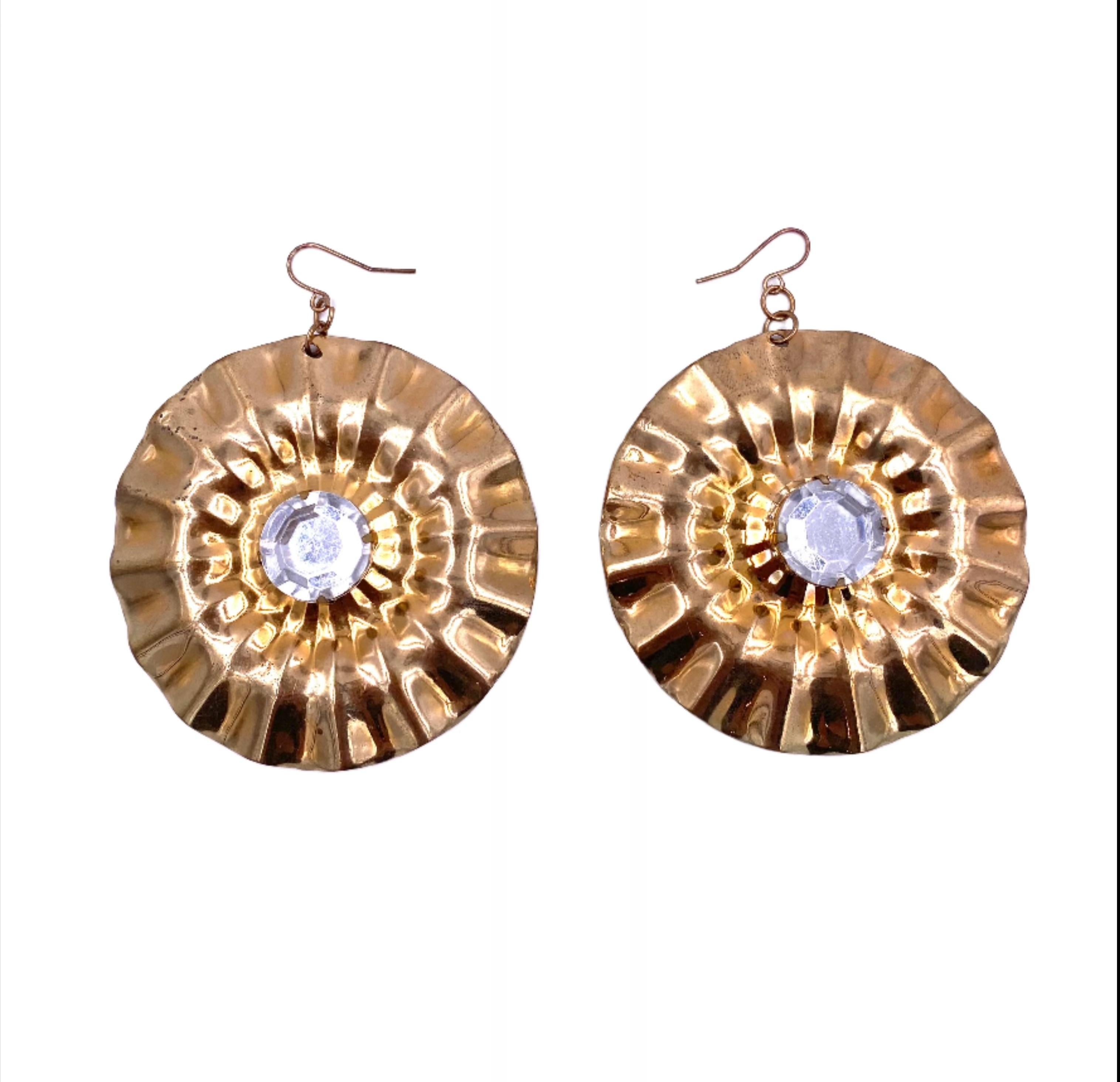 Adorn your ears with opulence and grace with our Vintage Large Round Gold Earrings. The elegant round shape and pinched pie crust texture exude sophistication, while the center crystal adds a touch of glamour. Elevate any outfit with these luxurious