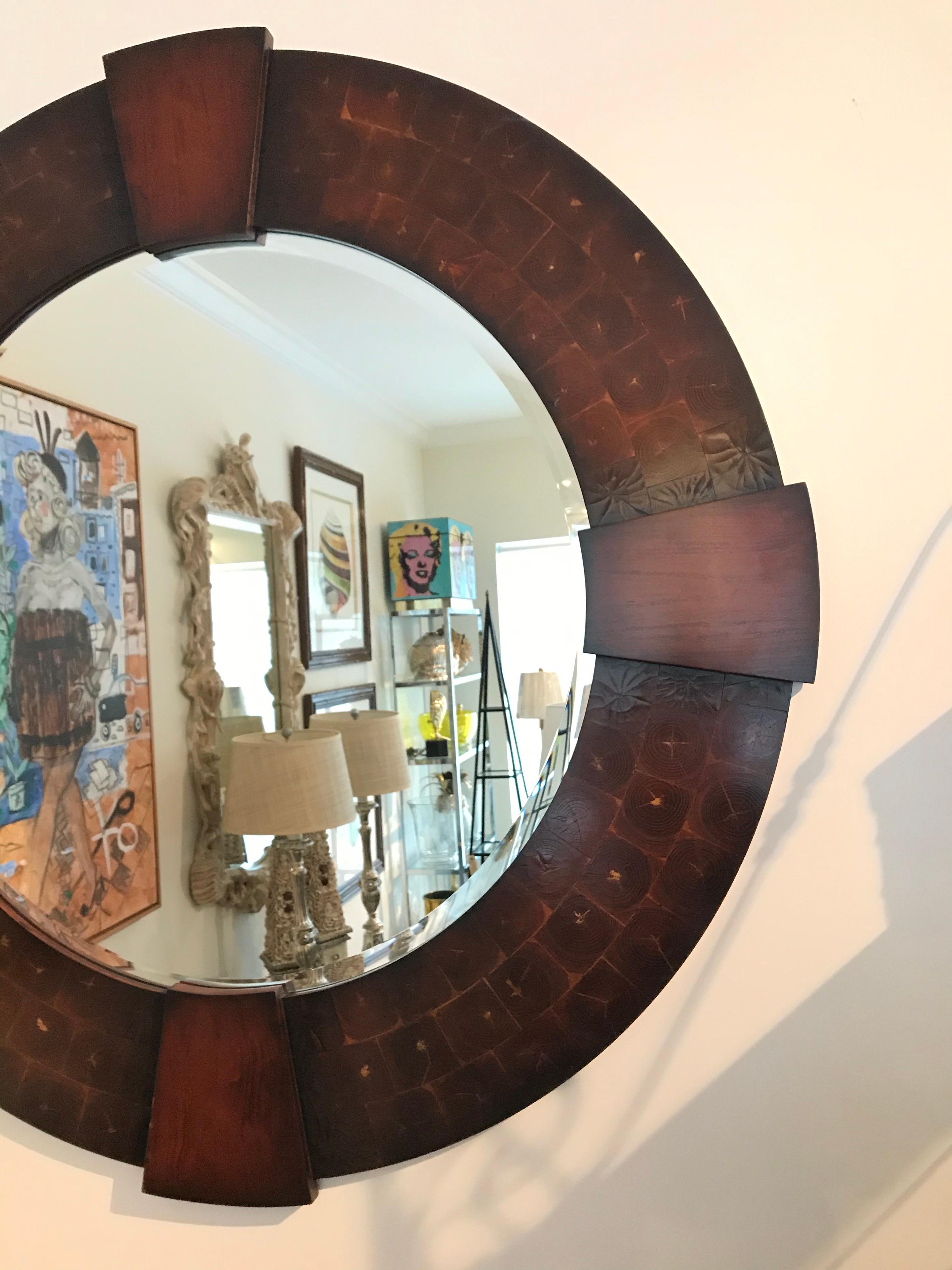 Large round oyster wood mirror with four matching pediments.