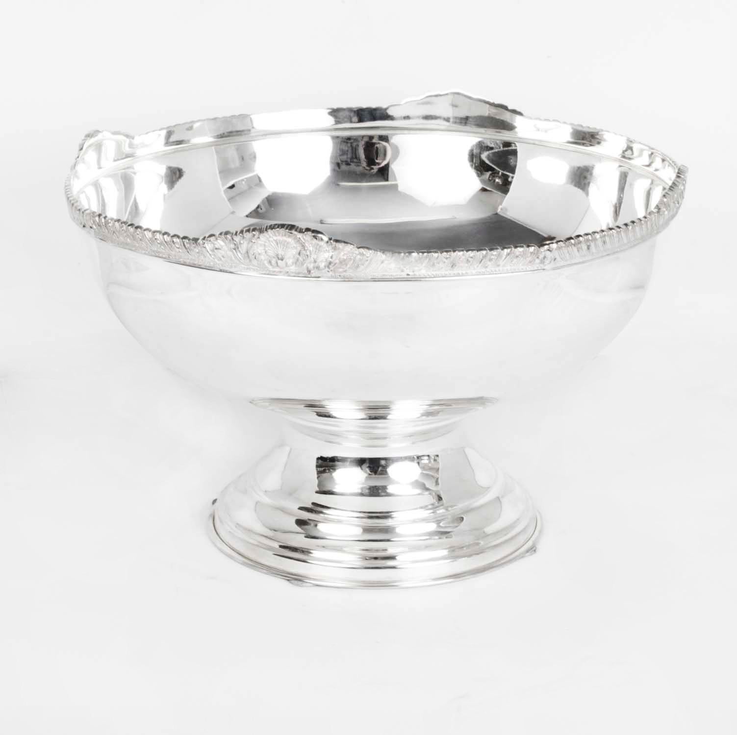 This is a beautiful large vintage silver plated champagne cooler that can acommodate 6 bottles with ease, bears makers marks on the underside and dates from the late 20th Century.

The quality and craftsmanship are superb and the bowl features