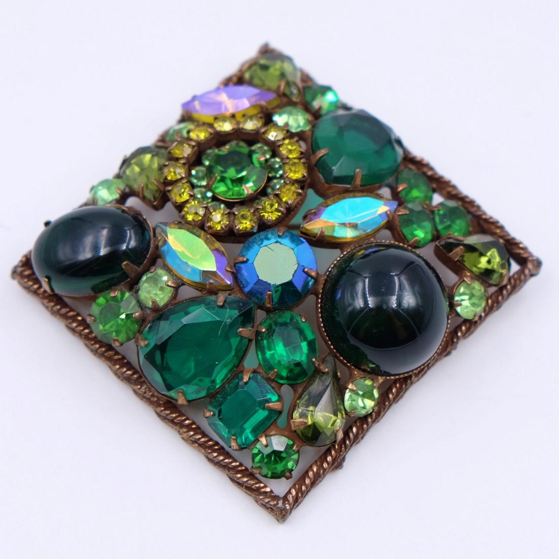 Contemporary high-quality square Weiss brooch attracts with its variety of green shades and shapes rhinestones. Weiss is a very well-known company for is high standards of craftsmanship.
Materials: Base metal, rhinestones
Height: 2.36 Inch
Hallmark: