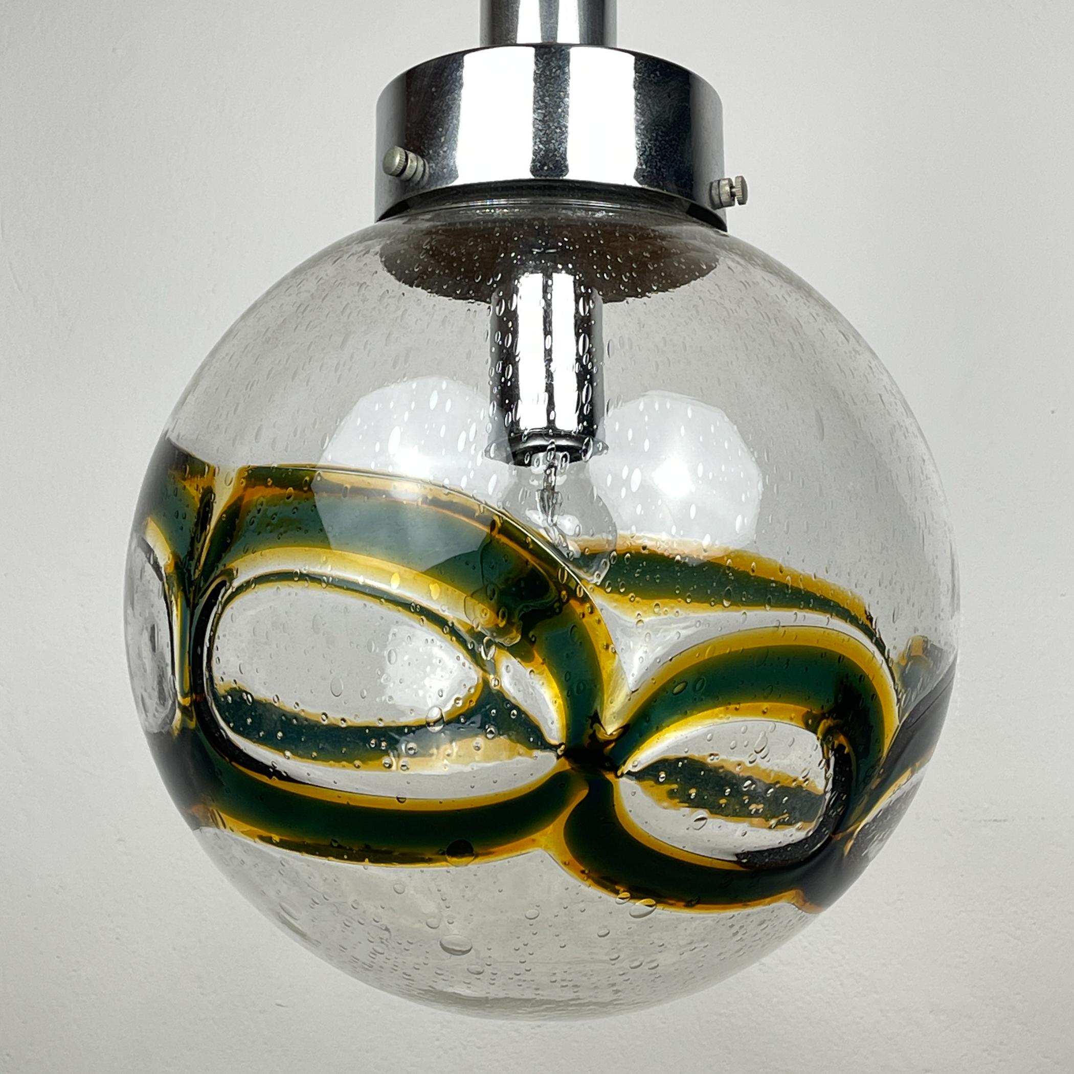 Vintage large lamp made from blown Murano glass with a swirl design. It was crafted in Italy in the 1970s using the 