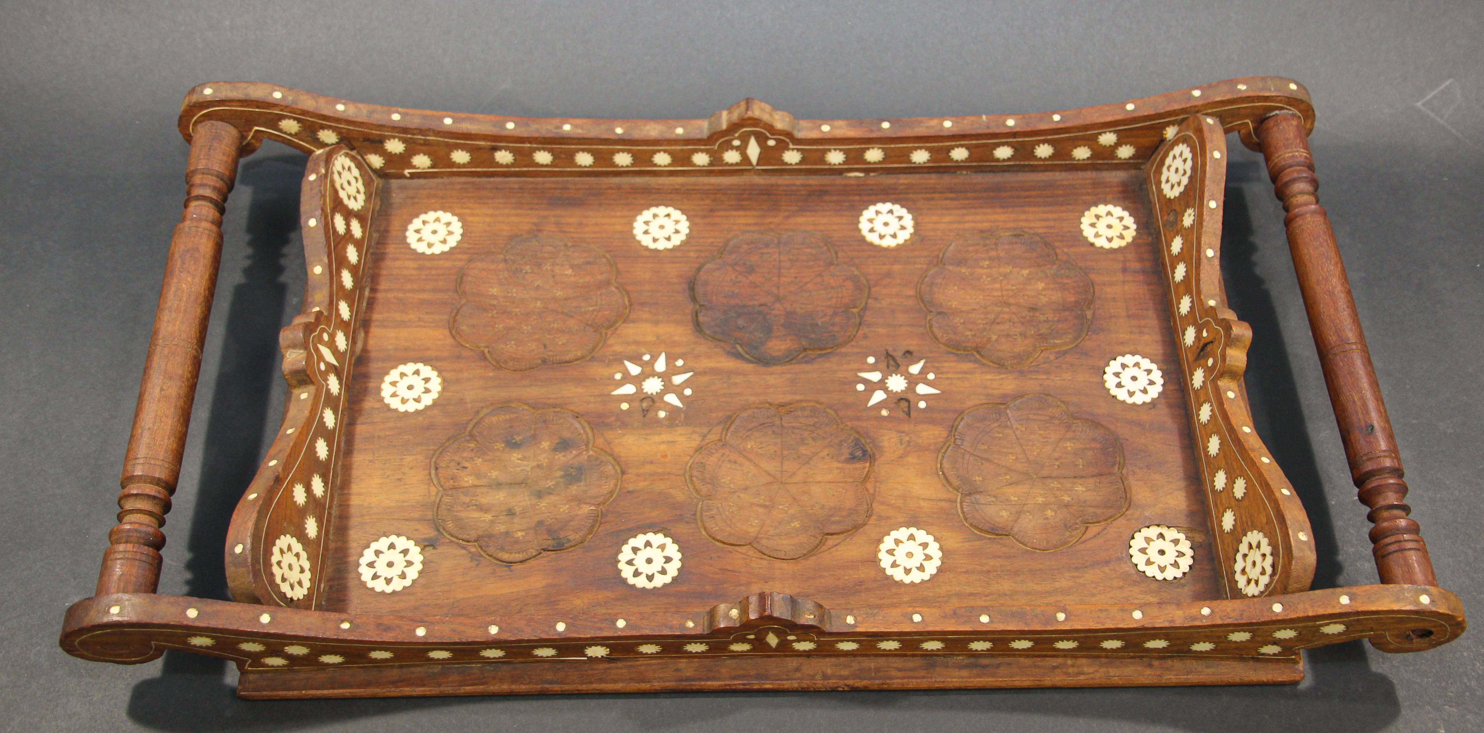 Vintage handcrafted large wood teak and bone inlay in floral motif and geometric hand carved Moorish designs with handles.
Handmade in India.
Measures: Rectangle: 22