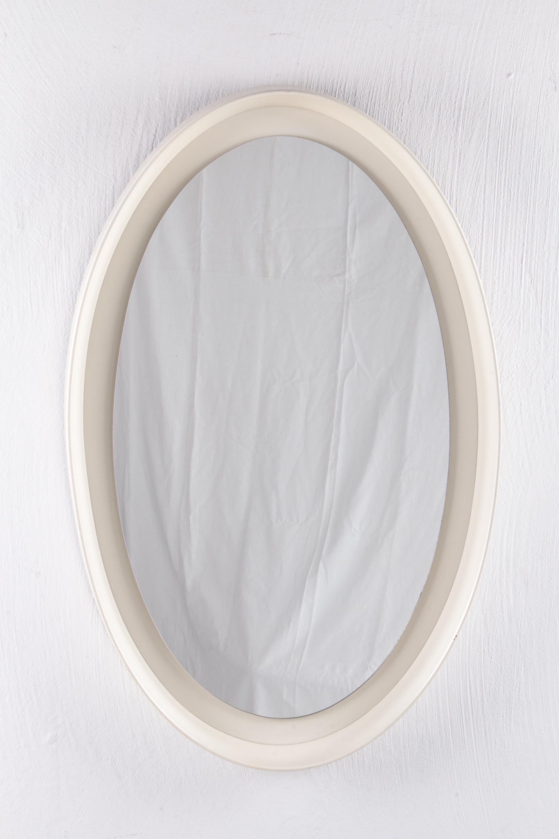Vintage large white wooden oval wall mirror 1960s

This is a beautiful Oval vintage mirror made in the 1960s. What would this mirror have seen before, we want to know even better.

You can hang this mirror in many places in your house.

The