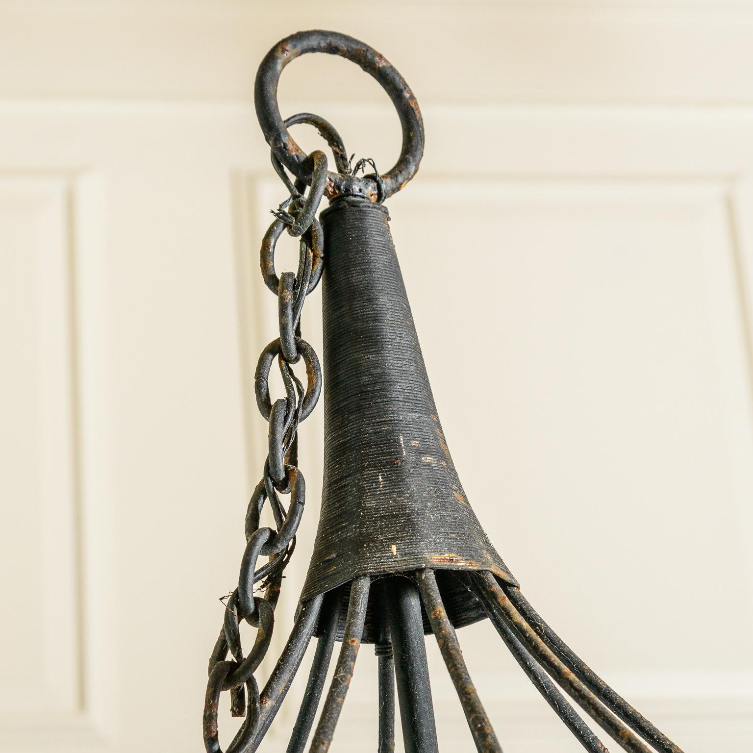 this is a wonderful preowned Vintage Large Wrought Iron 10 Candle Lights Cage Chandelier.
This chandelier has a great original patina to the iron,
It is in working order.
Very god vintage condition, consistent with age and use.
Please view all large