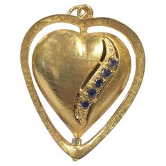 vintage large Yellow Gold and Gem set spinning Heart Charm Bracelet Charm