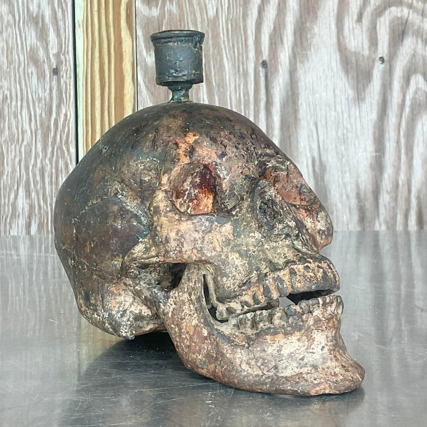 A fabulous vintage Boho candlestick holder. A chic bronze skull with a beautiful patina from time perfect as a candlestick holder, but would also be amazing converted to a lamp. Acquired from a Palm Beach estate