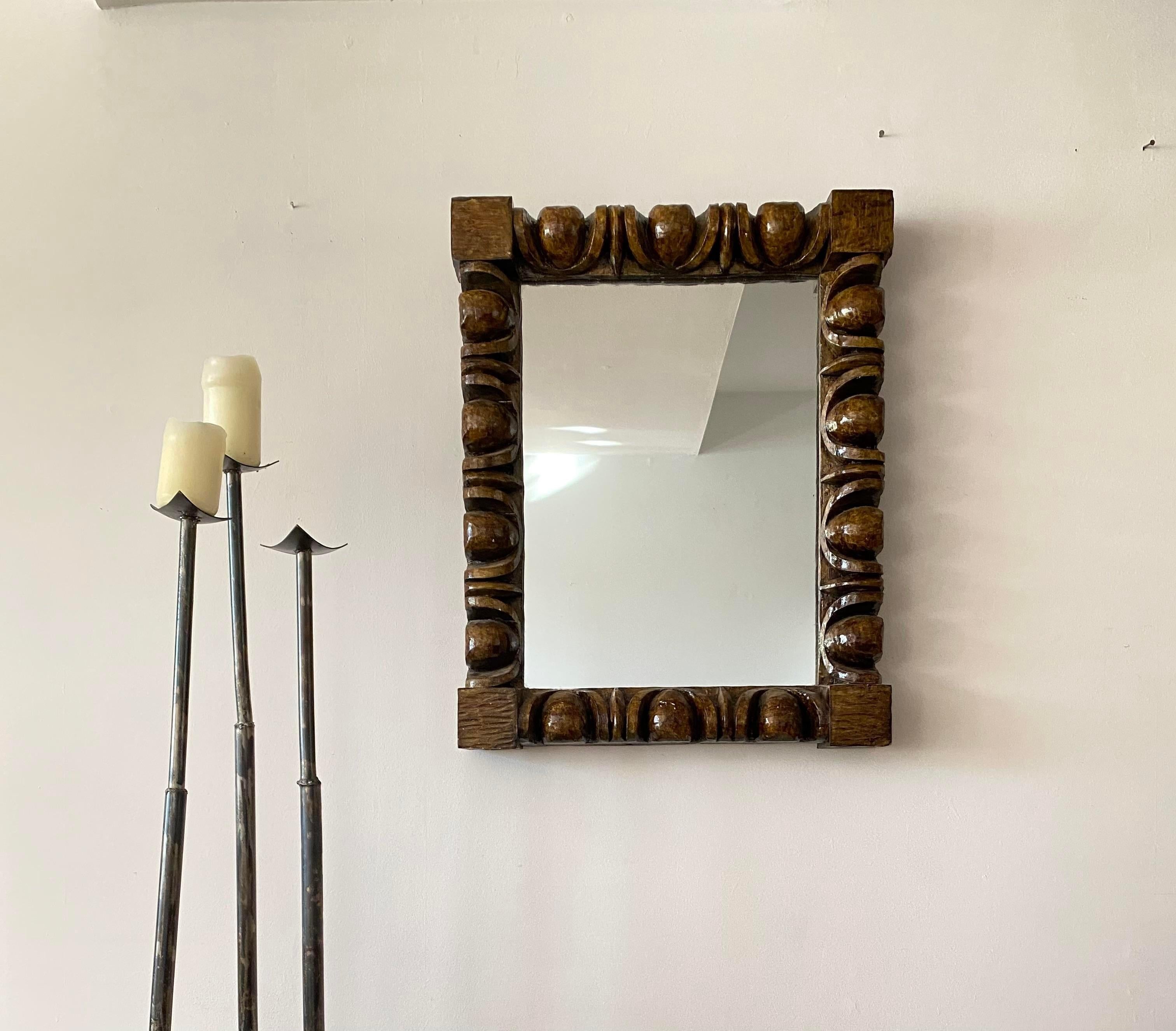 Brutalist Style Faux Wood Carved Wall Mirror is ready to hang.