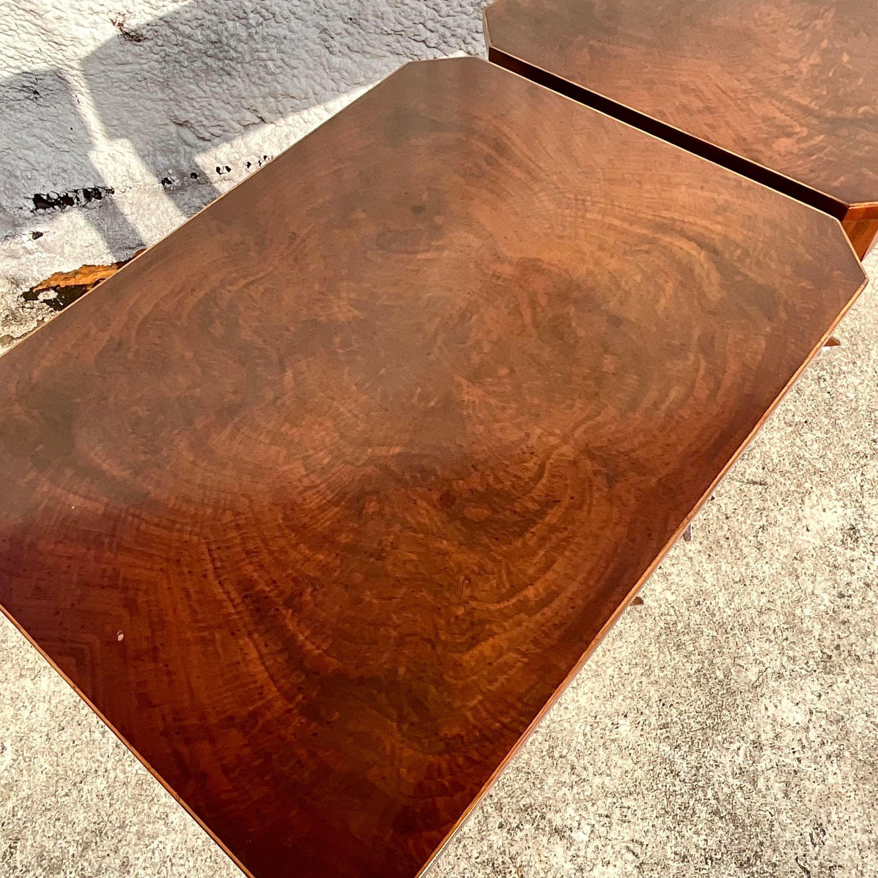 A stunning pair of vintage nightstands made of wood, each with one drawer and a small shelf. The pair is in this gorgeous dark brown color. Perfect to go beside your bed. Acquired at a Palm Beach estate