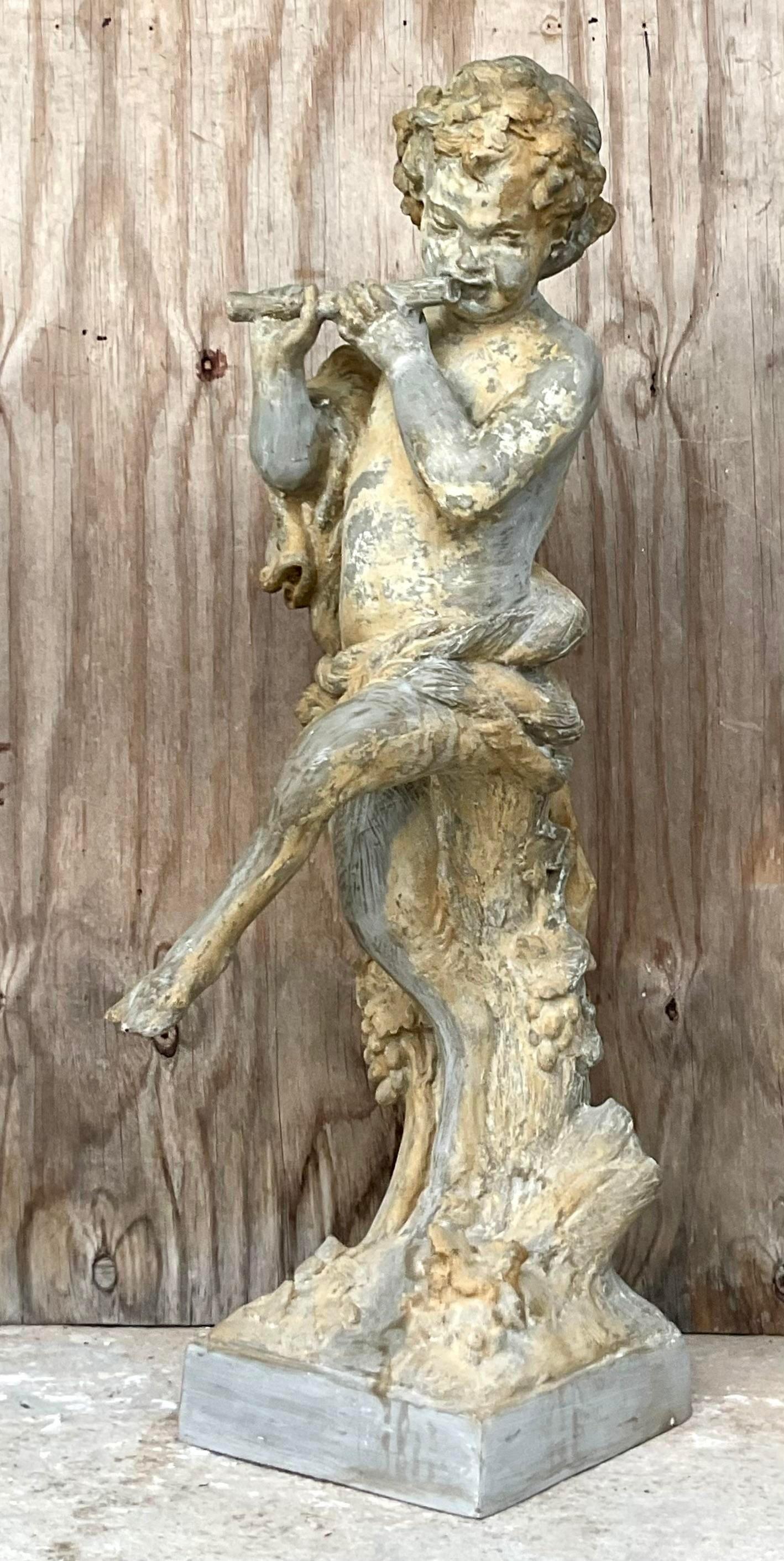 A fantastic vintage wood nymph playing music. A chic patinated resin with a gorgeous all over distressed finish from time. Perfect indoors or outside. Acquired from a Palm Beach estate.