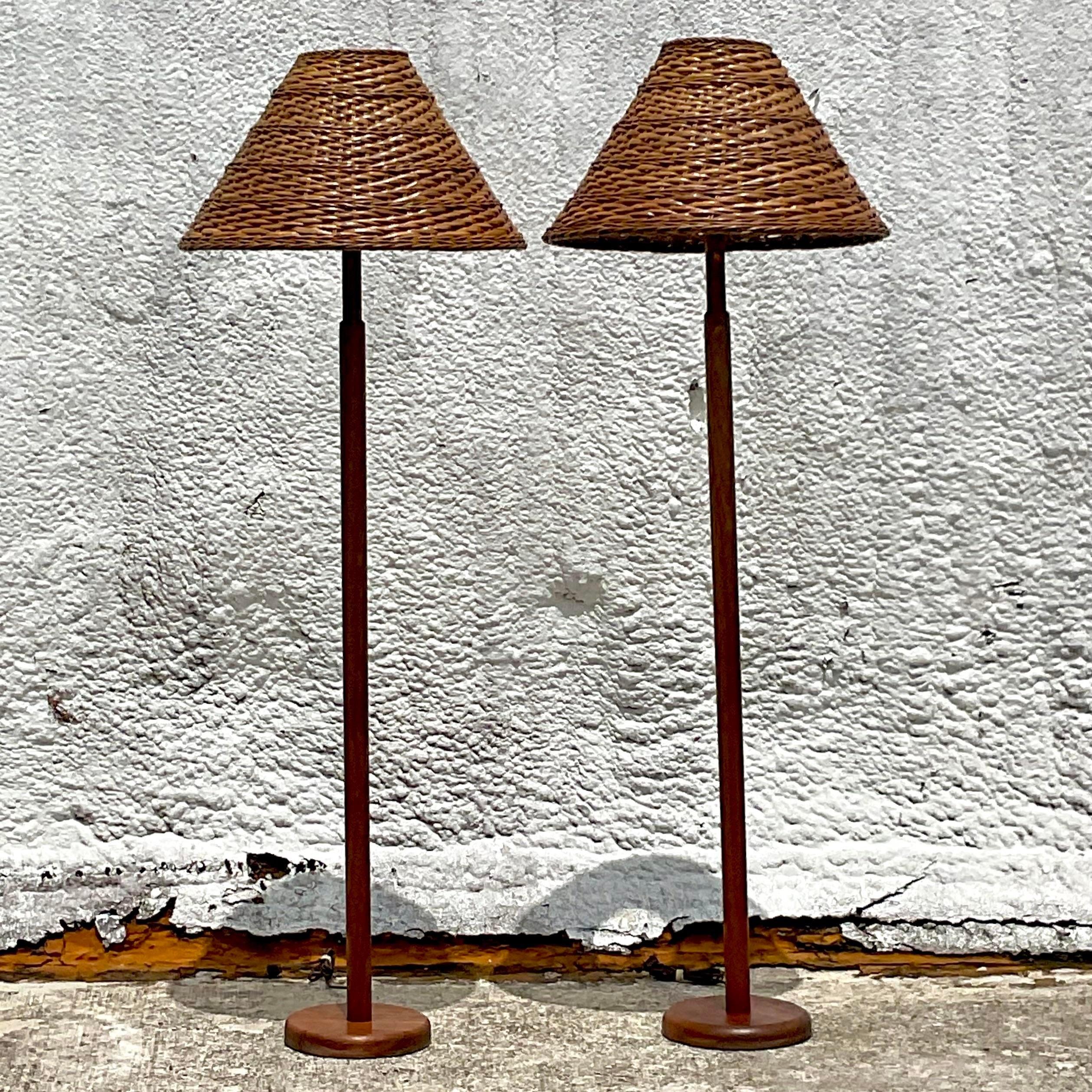 American Vintage Late 20th Century Teak Floor Lamps With Woven Rattan Shades - a Pair