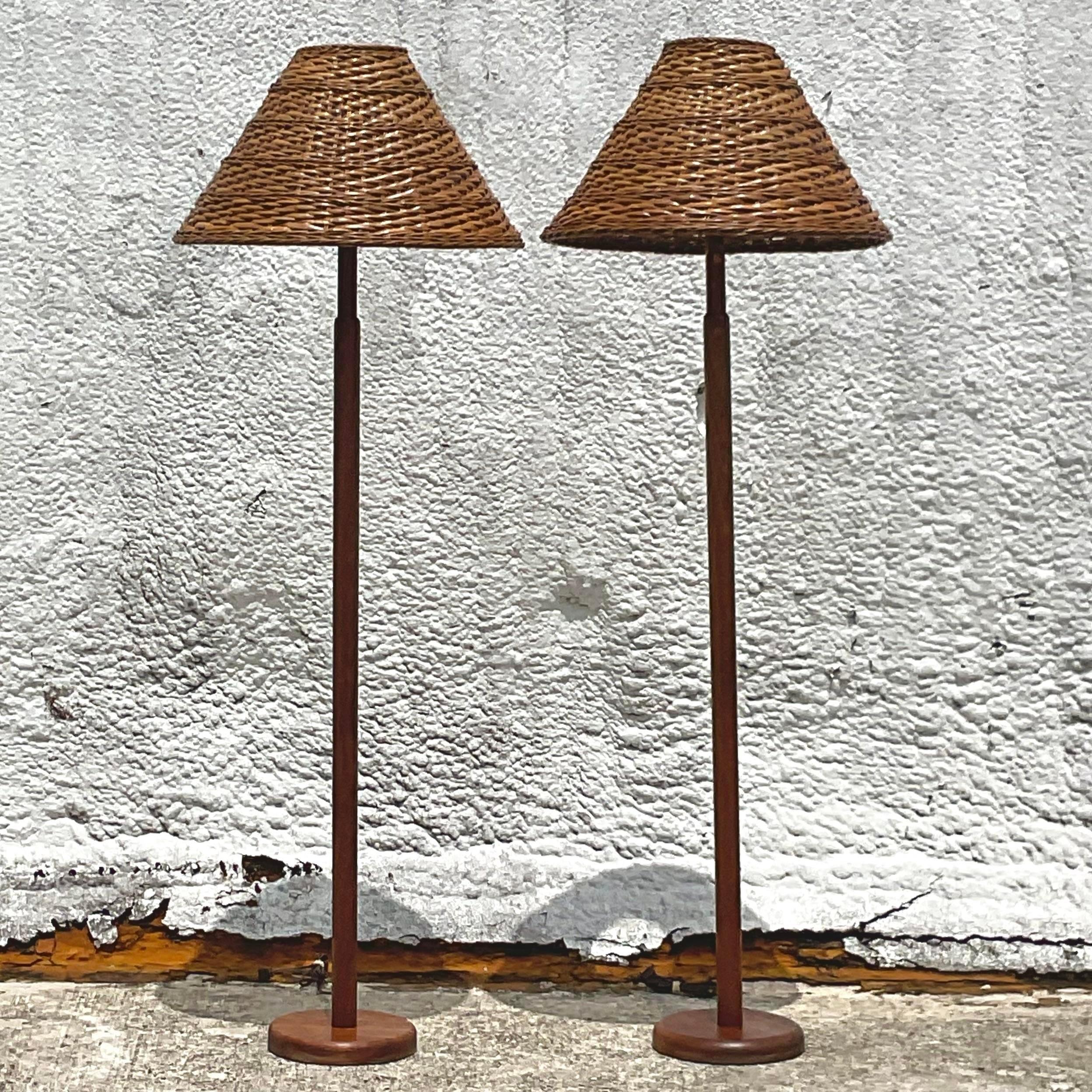 Vintage Late 20th Century Teak Floor Lamps With Woven Rattan Shades - a Pair In Good Condition In west palm beach, FL